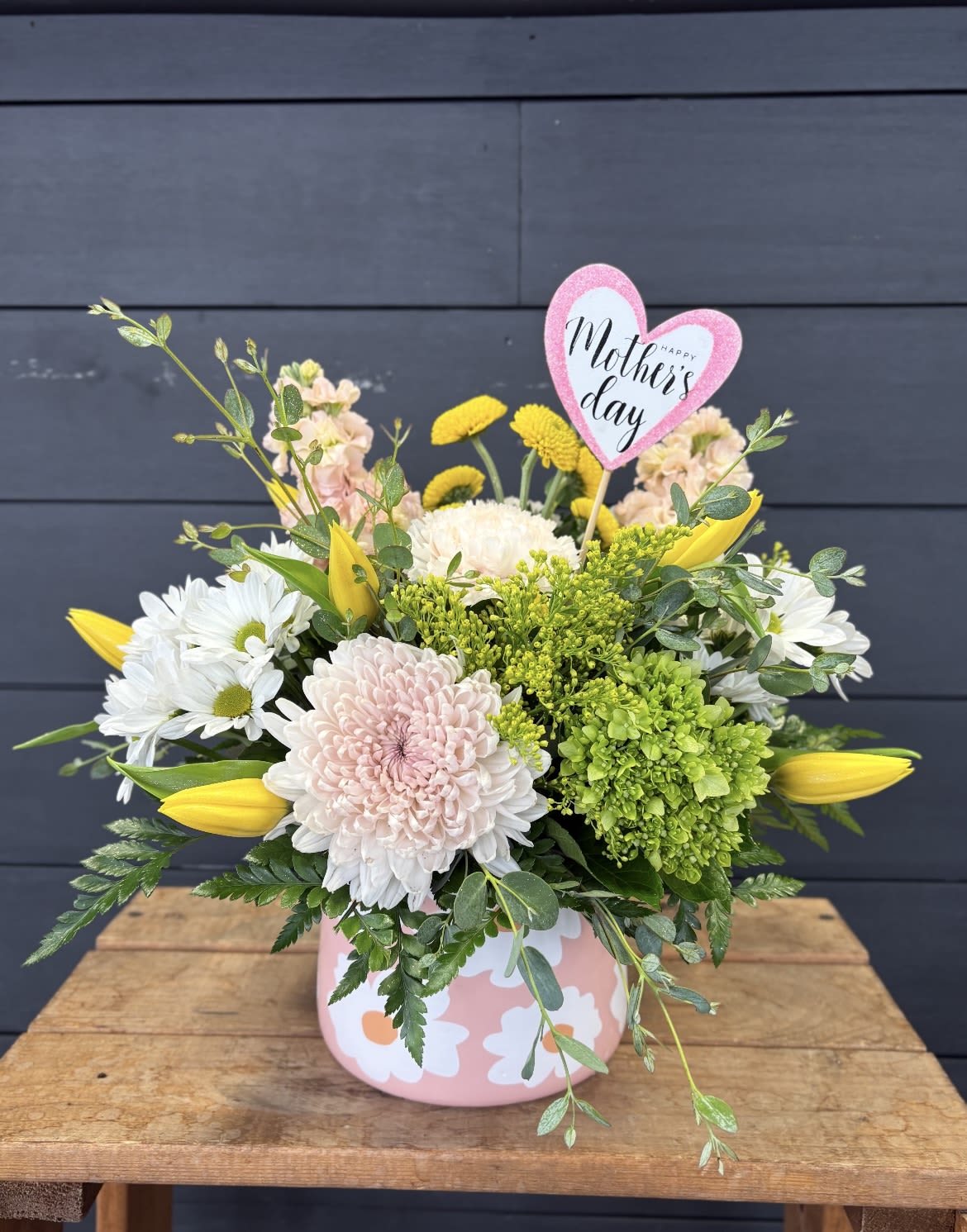 Princess Peach - This cute daisy ceramic container is filled with colorful flowers.