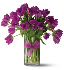 Passionate Purple Tulips - Premium [30TULPU] - Thirty luscious tulips in a color so enchanting you could get lost in it. Who wouldn't be delighted to open their front door to this beguiling floral gift?  Thirty purple tulips arranged in a clear glass vase, tied with a purple ribbon. Order online today for same-day delivery      As Shown : 30TULPU  