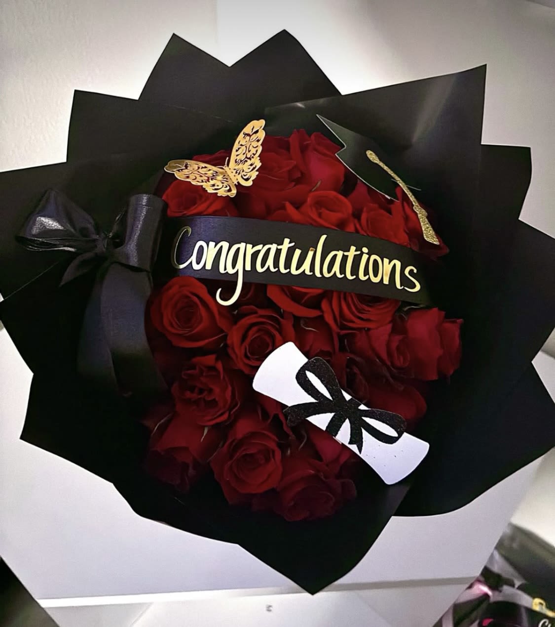 Bouquet for graduation  - Beautiful graduation bouquet with 36 roses in red, and black wrapping 