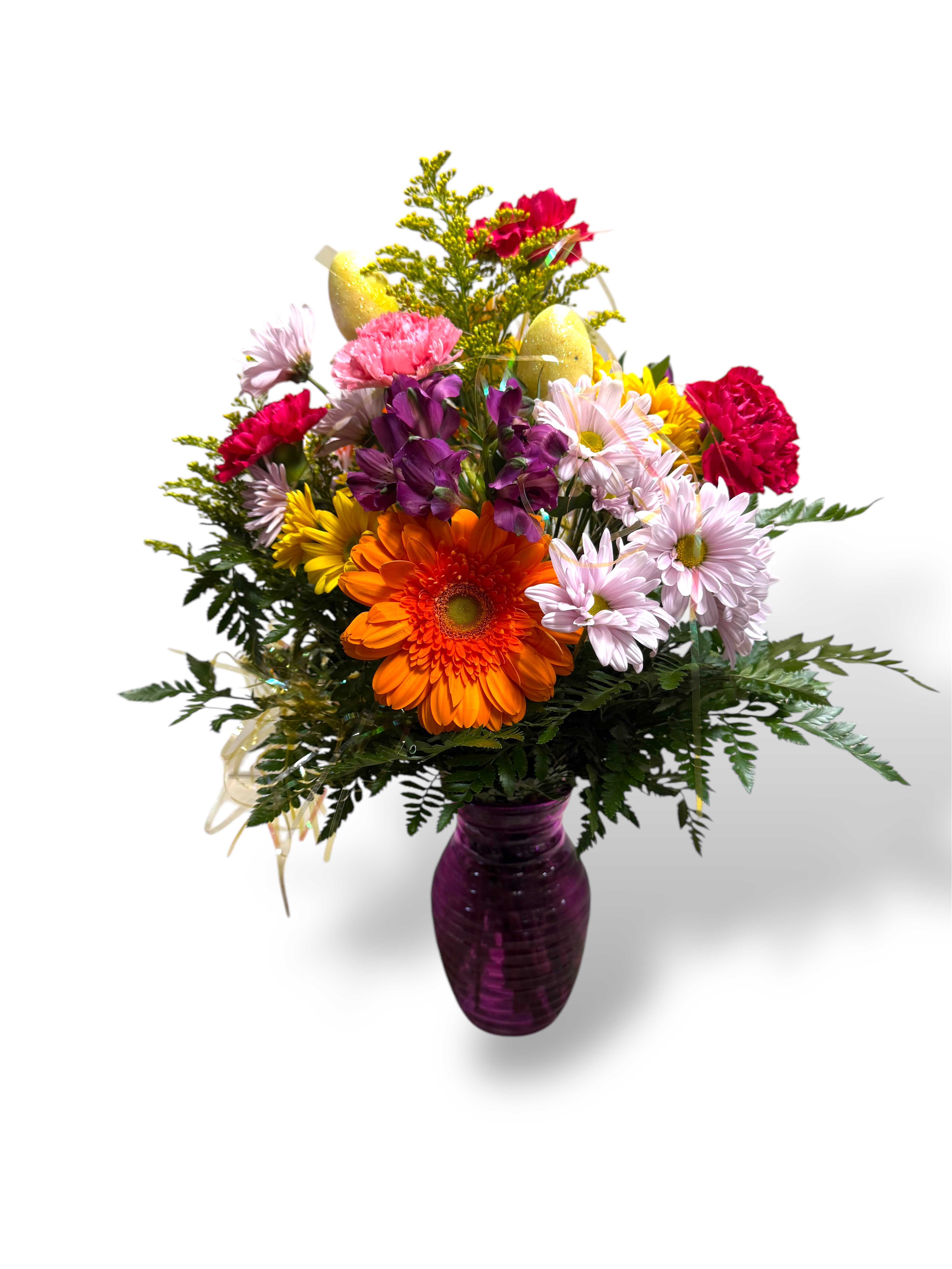 Spring fling - A beautiful glass colored vase stuffed with beautiful flowers perfect for a spring fling