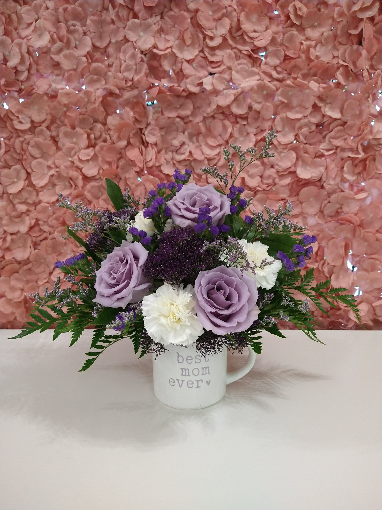 Mother's Day Mug Best Mom - Assorted florals in a white and purple ceramic mug that says "Best Mom ever".
