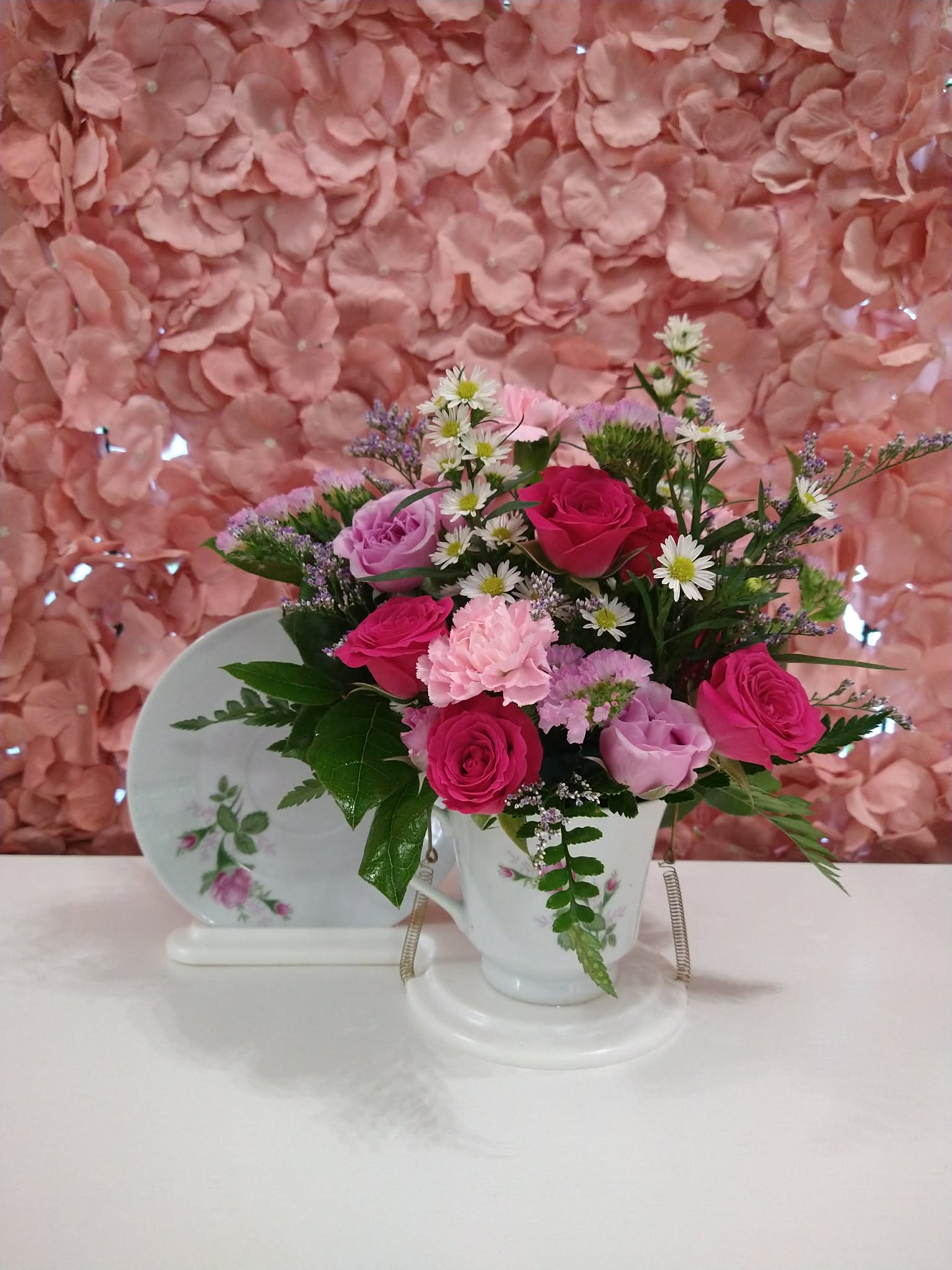 Mother's Day Teacup - Assorted florals in a porcelain tea cup with a stand to display it. Colors vary, please specify in special instructions unless you want designer' choice.