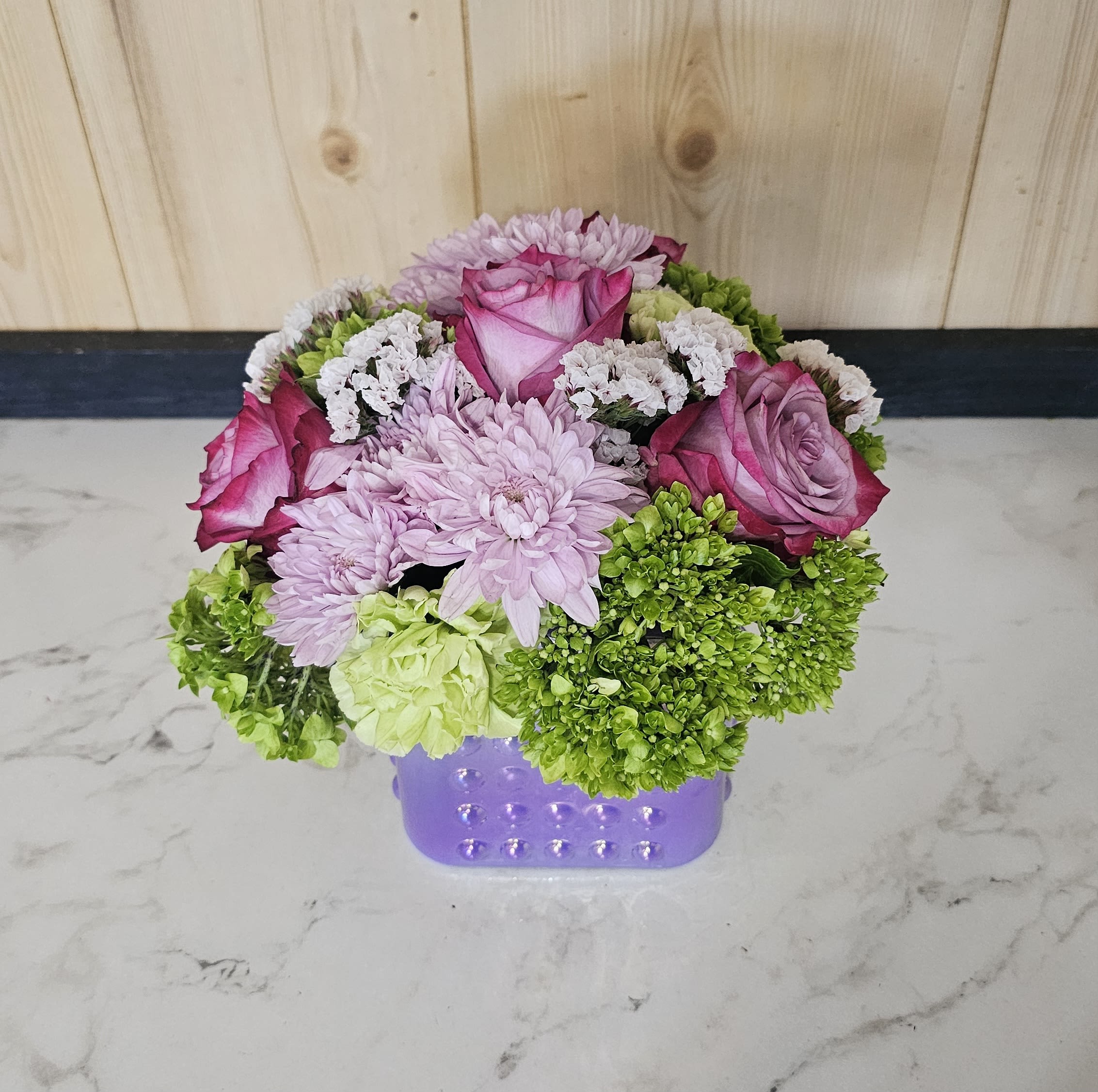 Mom - Designers choice arranged in a square purple vase.