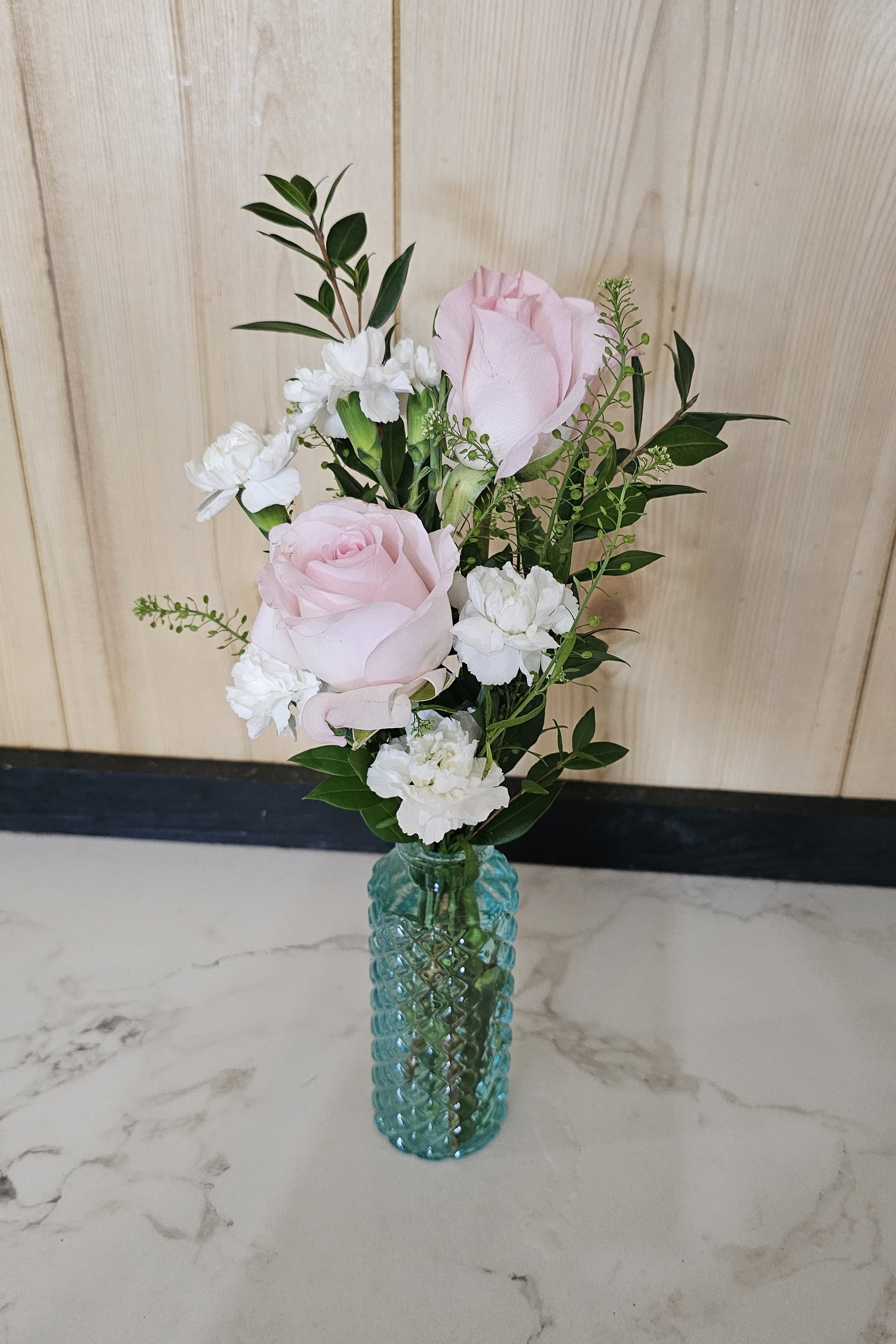 Simply Perfect - Rose arrangement in a colored vase. A prefect little vase to brighten someone's day.