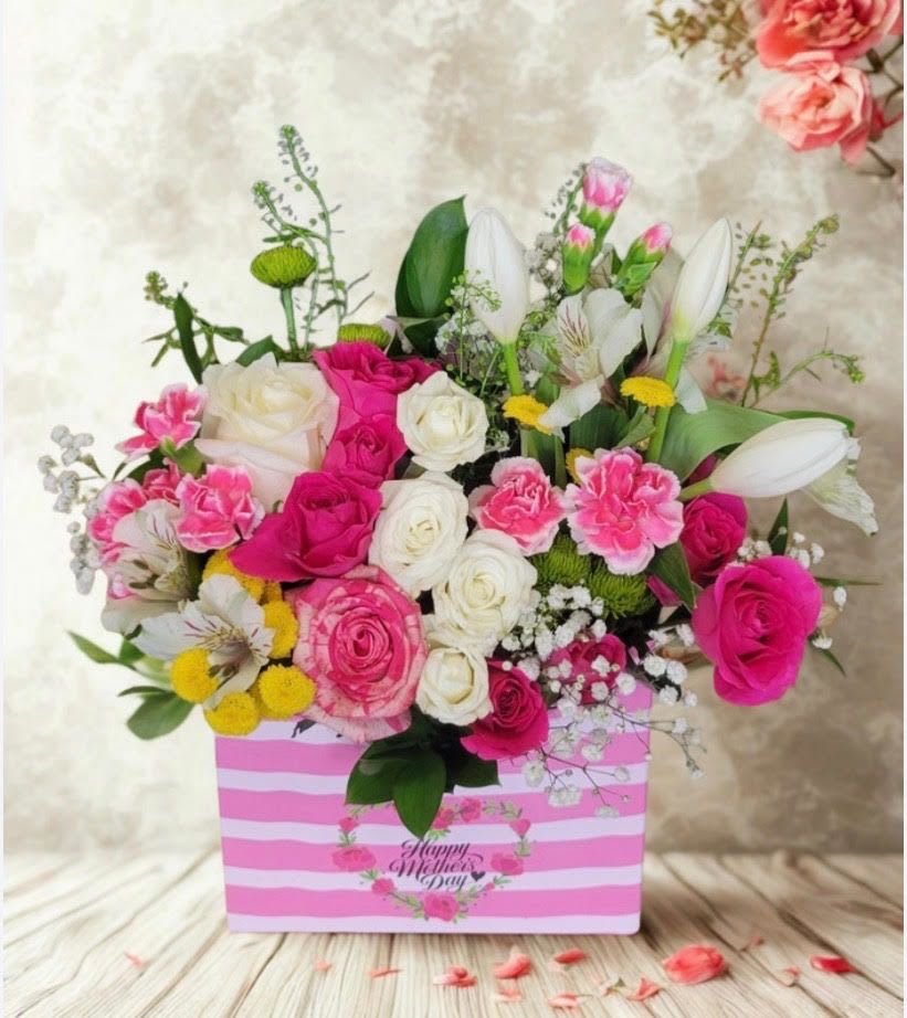 Mommy Day Box - A Charming Mother's Day designers choice arrangement bursting with fresh blooms beautifully styled in keepsake box. Full of Love perfect for making mom feel extra special