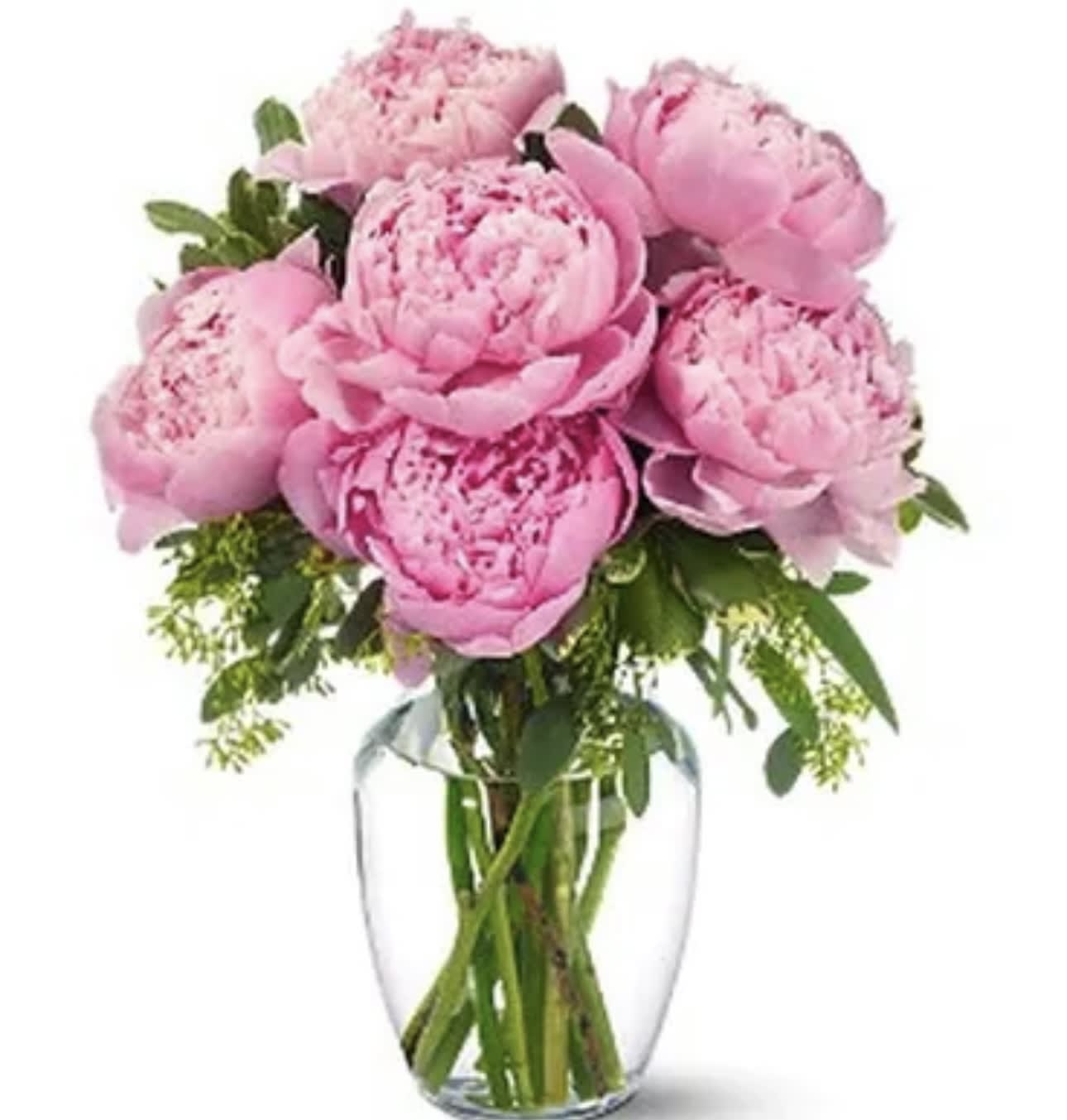 Pink peonies arranged in a clear glass vase