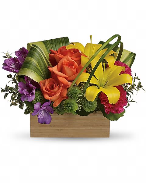 Orange roses and yellow lilies in a wooden box with purple accents
