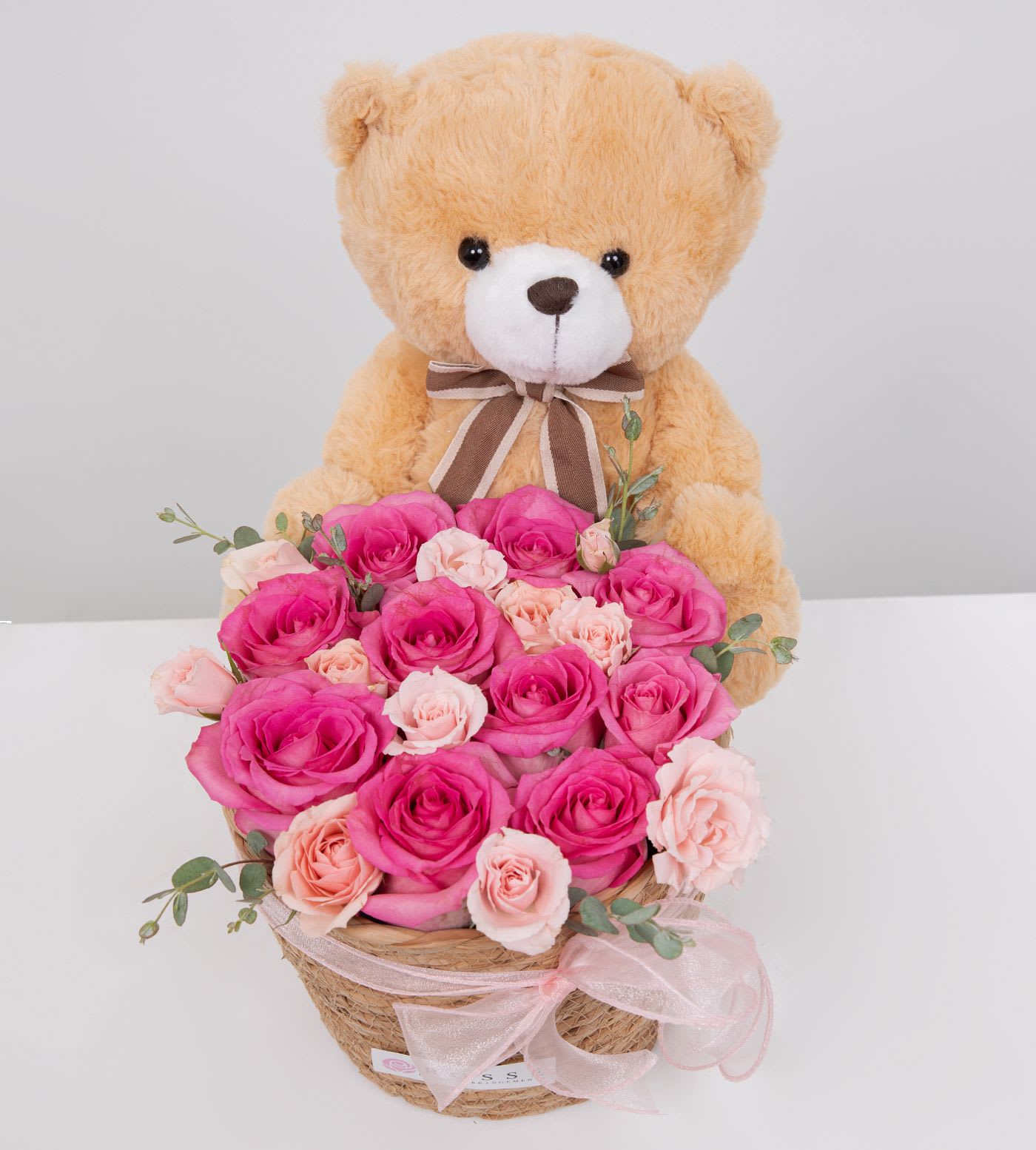 Teddy Love Blooms - A sweet mix of pink roses and a cute teddy bear, all in one cozy basket. Perfect for making Mom smile and showing a little extra love this Mother’s Day 