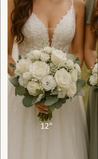 Bridal Bouquet- Hint of Blue - Mainly white roses. With a hint of blue flower. White roses and  a hint of blue delphinium. 