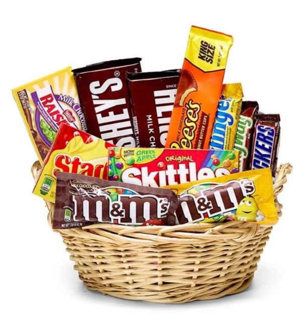 Basket filled with assorted candy bars and chocolate packs