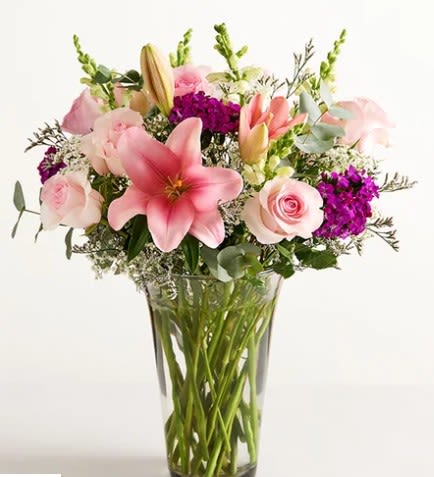 Marvelous Mom Bouquet - Pink lilies and pale roses with vivid purple accents, snapdragon spikes and airy white blooms in a clear glass vase-cheerful, garden-style bouquet for birthdays, anniversaries, or just because.