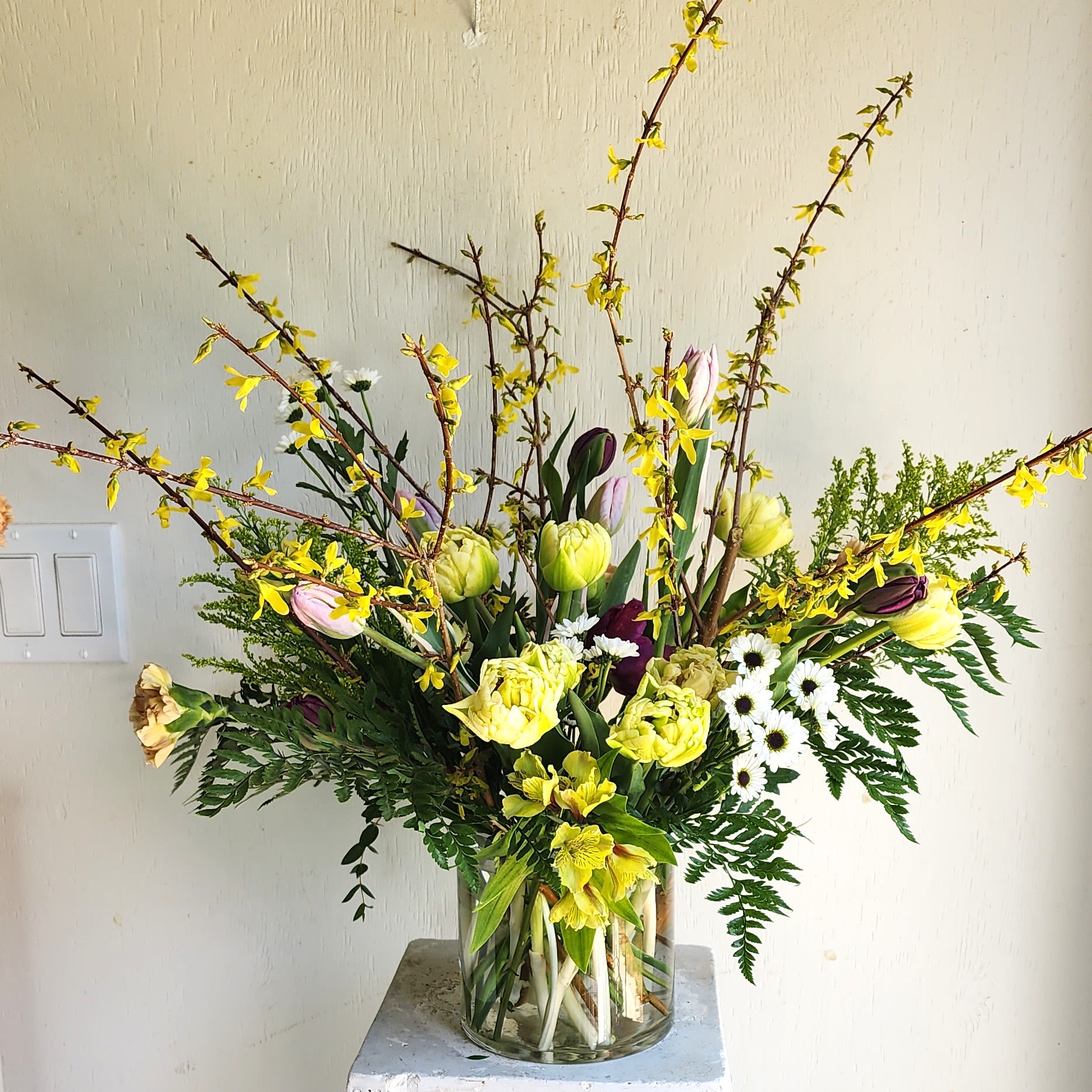 Lemonade Spring - We are a small studio florist in a small town. Every bouquet we create is a one-of-a-kind creation, tailored to the season, availability of flowers, color choice, artistic interpretation, and the current materials available. The photos do not represent the exact flowers that will be delivered. They are intended to provide you with an idea of  the variance that can be expected.  The season, availability of flowers,interpretation, and the current materials available.  