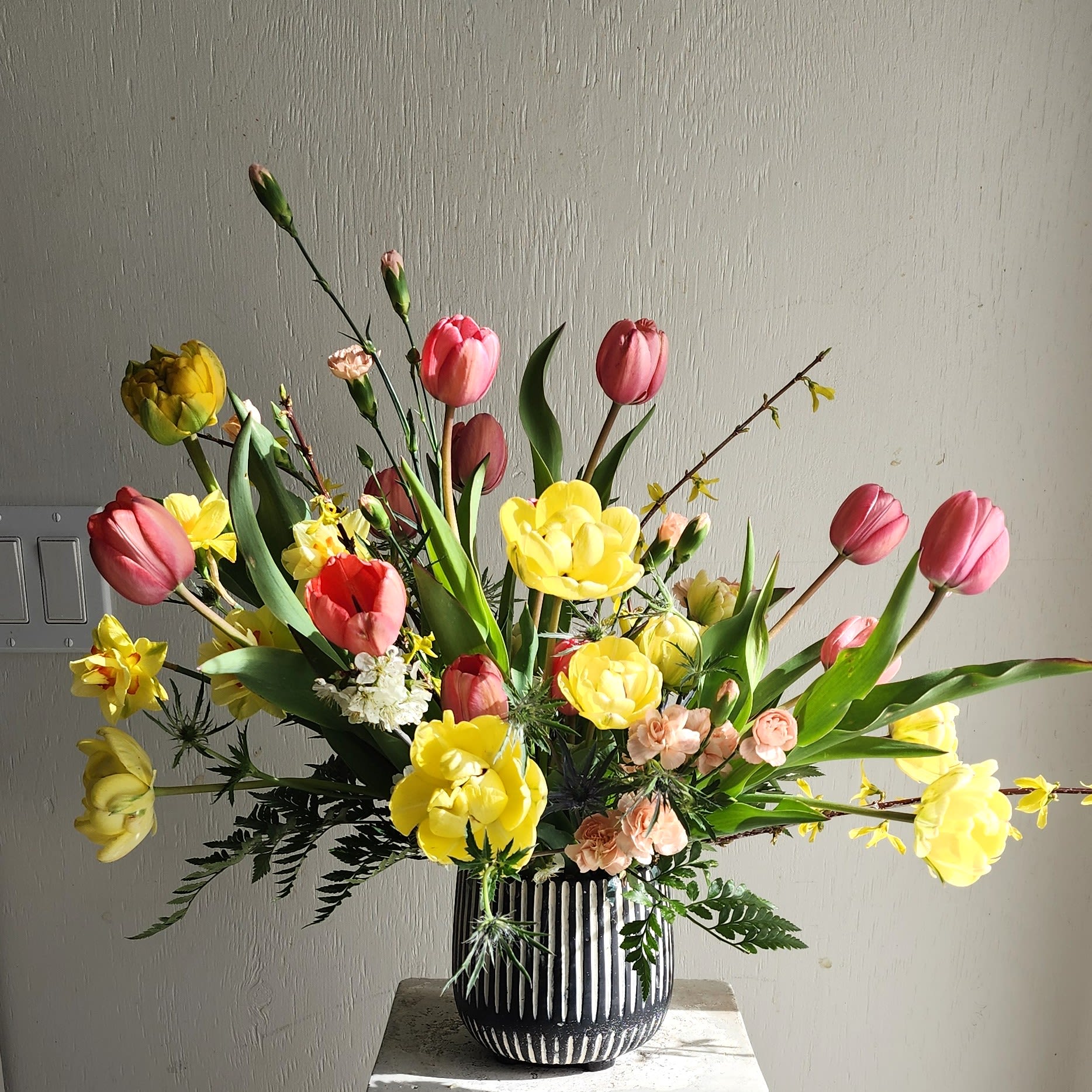 The Sunlit Pollinator  - We are a small studio florist in a small town. Every bouquet we create is a one-of-a-kind creation, tailored to the season, availability of flowers, color choice, artistic interpretation, and the current materials available. The photos do not represent the exact flowers that will be delivered. They are intended to provide you with an idea of  the variance that can be expected.  The season, availability of flowers,interpretation, and the current materials available.  