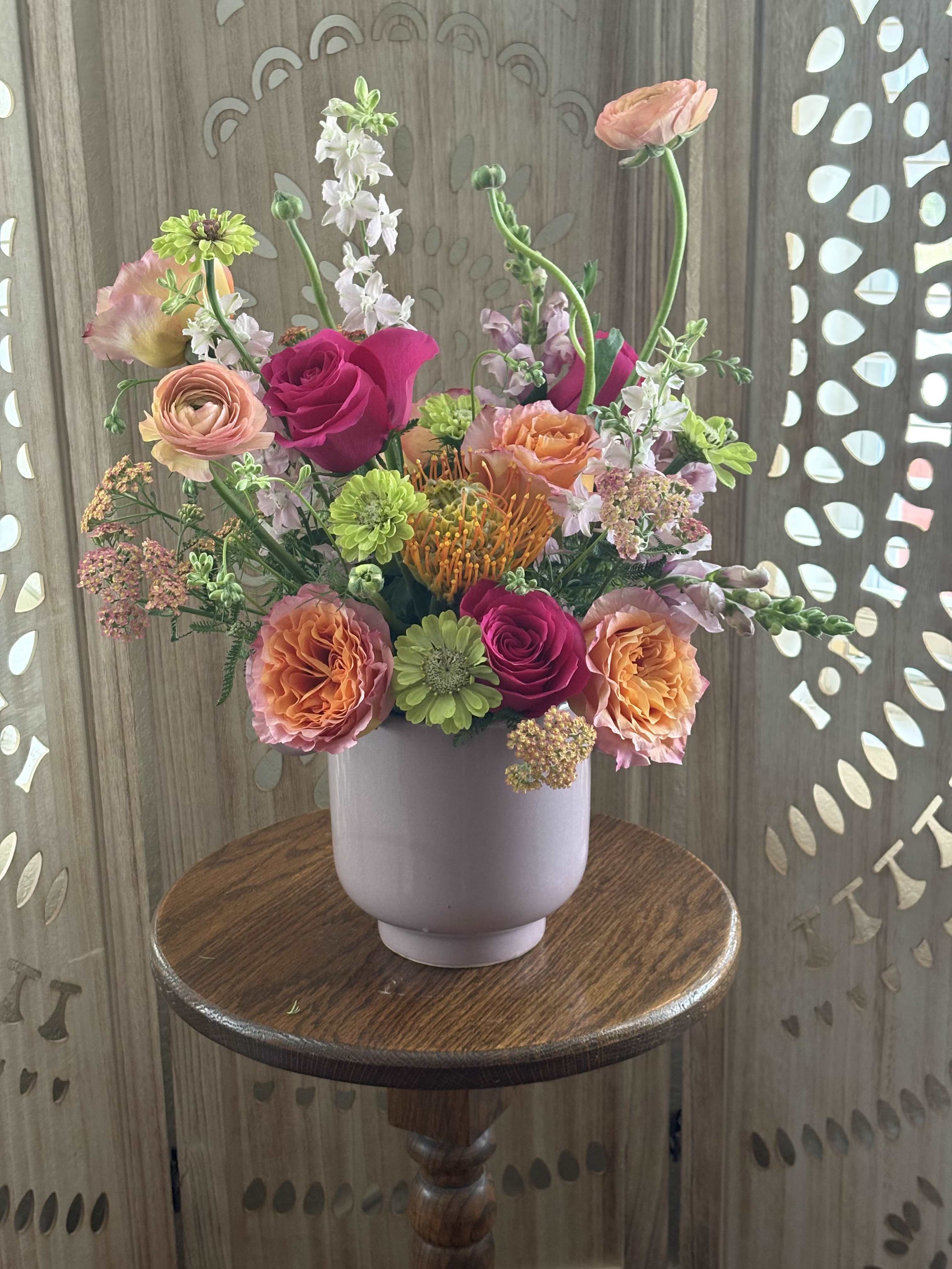 Mama’s Garden Grove  - Bringing a fresh, groovy twist to classic garden florals. Harvested from the Hill Country. Bright, joyful, and unapologetically fun just like Mama!