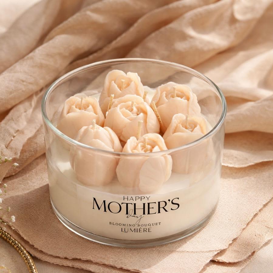 Tulip Bloom - Invite warmth and tenderness into every room with the Tulip Bloom — a 24 oz hand-poured luxury soy candle lovingly crafted to celebrate the woman who deserves nothing but the finest.   Inside, a 100% pure soy wax base — completely paraffin-free and non-toxic — releases a slow, even burn