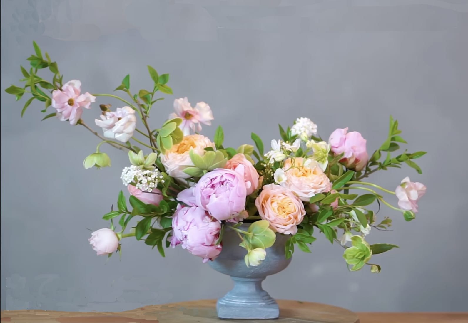 Asymmetric Designer Choice - An example of what we can do is in this photo..but the design will be made with what we have in stock... our fresh flower blooms.  If you desire exactly what is in the photo.. say so in the comments...but order 2 weeks ahead of time so we can source the blooms.  Thank you (containers will also vary, but will compote style in nature)