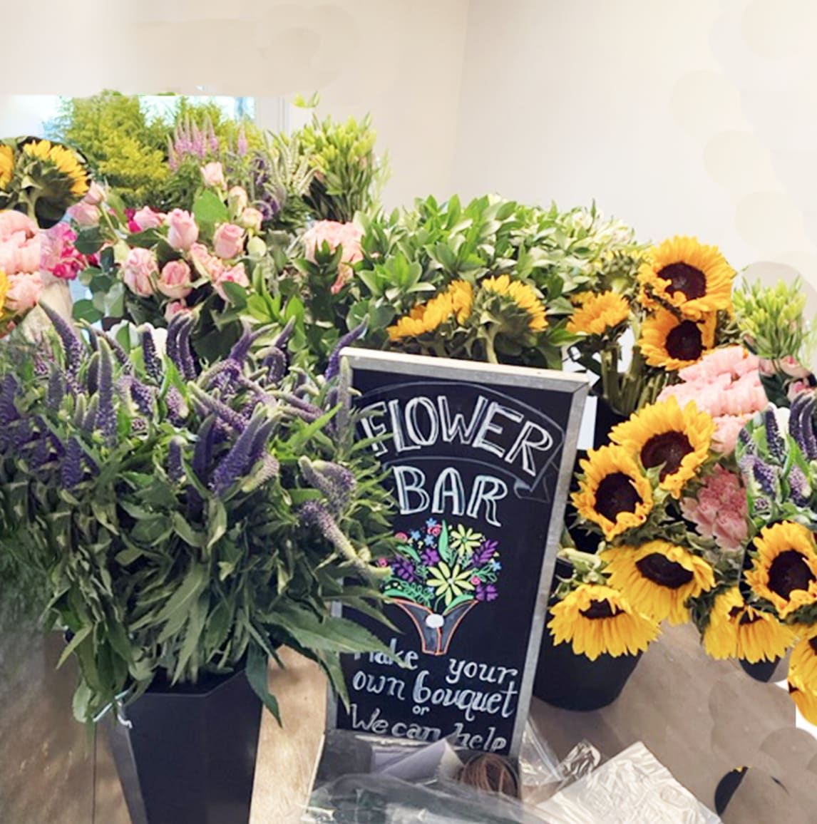SHOWER FLOWER BAR - CALL and we can discuss the flowers you want for your special occasion: Birthday, shower, bridal shower: corporate event, office party.  Price includes delivery, clean up , snips, flower recipe, sign,10 flowers and greenery, packaging sleeves, ribbon, rubber bands. (add on is having staff unhand for event)