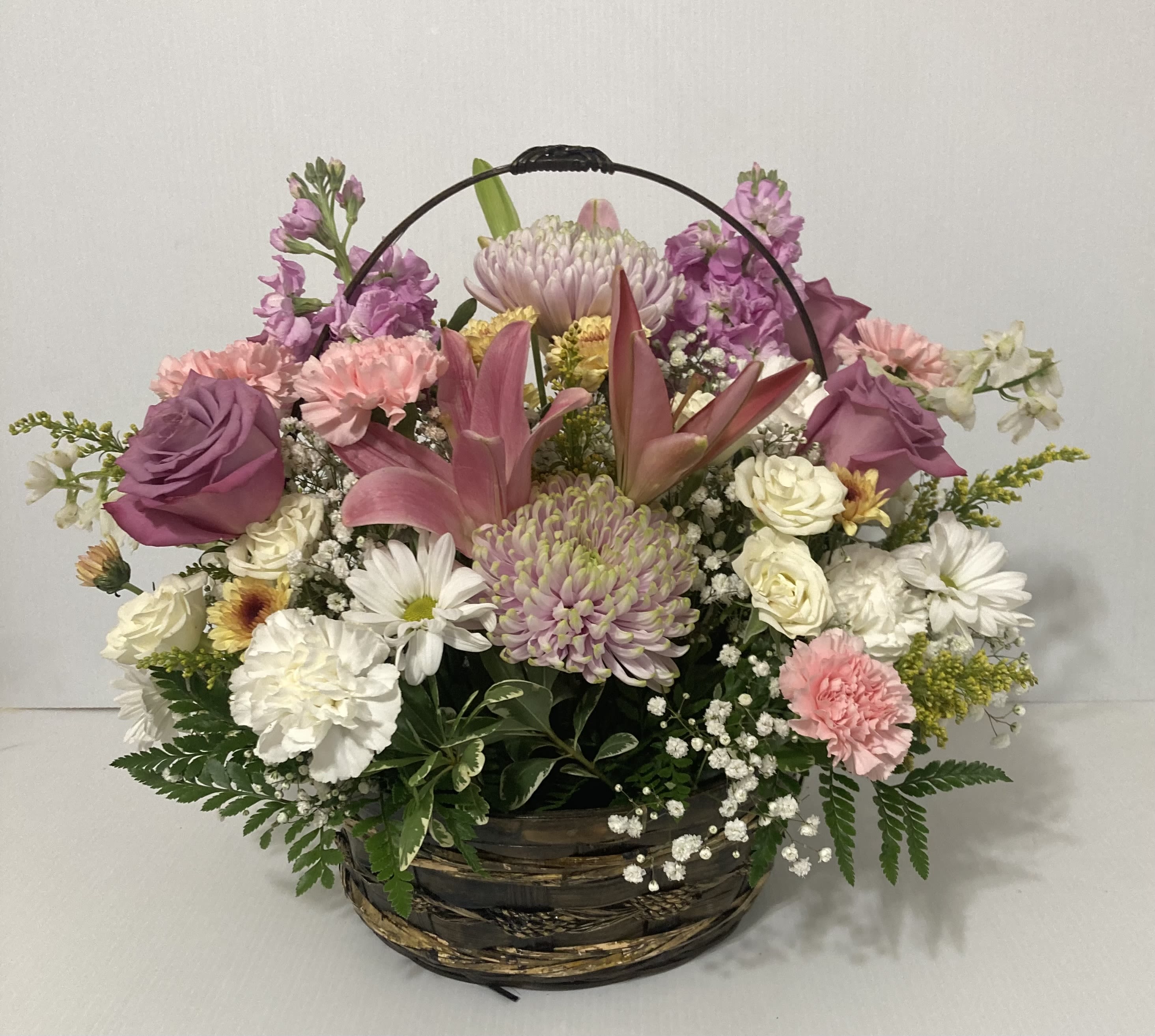 Mothers Day Basket of Love - Beautiful Arrangement perfect for Mothers Day which includes Lilies, Roses, Carnations, Daisies, Mums, and Filler flowers and Greens