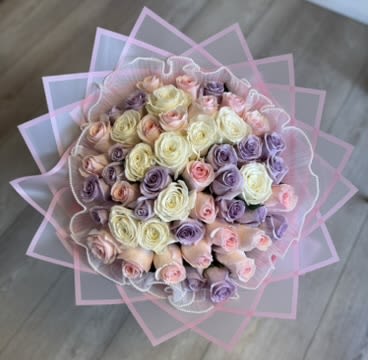 Lavender Elegance Bouquet - Refined and captivating, the Lavender and Blush Elegance Bouquet embodies modern sophistication. A graceful blend of premium lavender, lilac, and blush roses creates a soft yet striking composition, symbolizing elegance and tranquility. Wrapped in sleek, layered matte paper, this bouquet offers a contemporary aesthetic with timeless allure. Perfect for refined gifting or upscale events, it’s a true statement of effortless luxury and style.