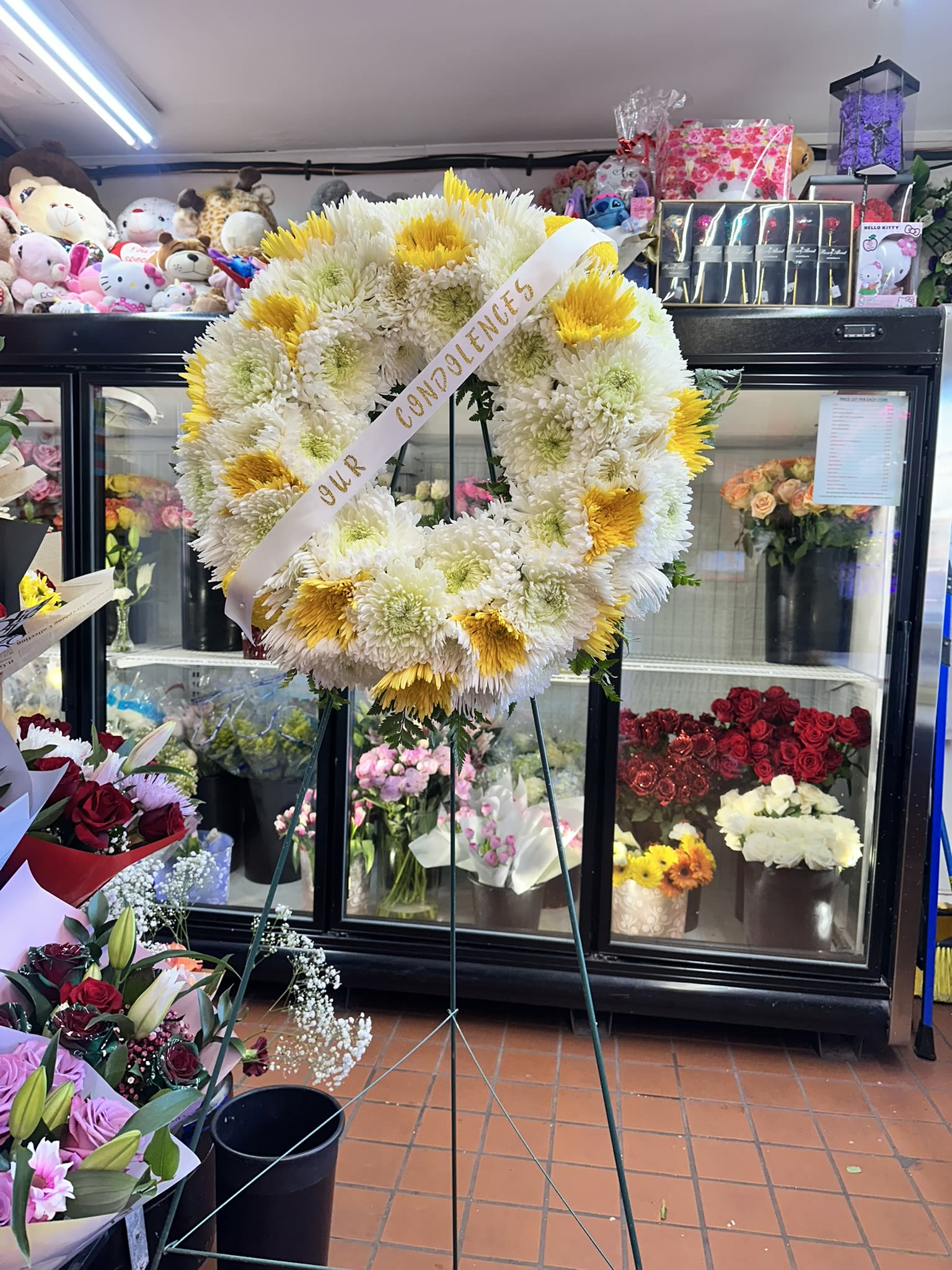 Our Condolence's Sympathy Floral Crown Arrangement - .