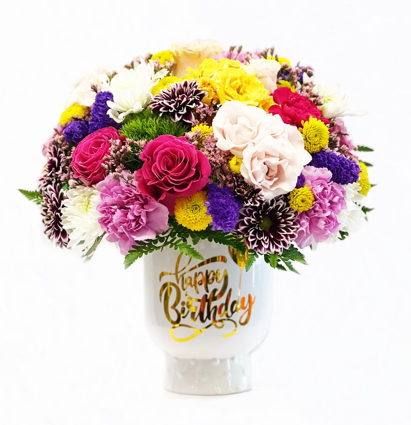 Mixed bouquet in a white vase with a Happy Birthday message