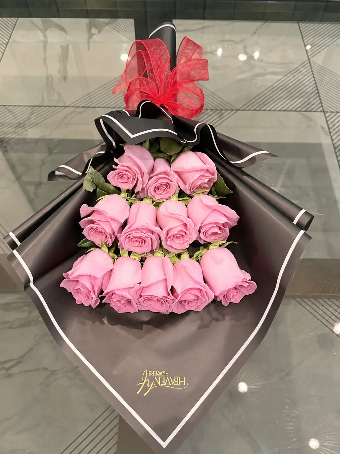 Mother’s Day 12 Roses Special – Same Day Delivery LA - 12 Fresh cut Natural Flowers  Experience elegance and romance at its finest with our exclusive bouquet of 12 premium red roses. Each rose is carefully selected for its freshness, vibrant color, and intoxicating fragrance, ensuring they convey your feelings of love and passion in the most beautiful way. Perfect for any special occasion or to surprise that special someone, our red roses are the ideal gift to leave a lasting impression.