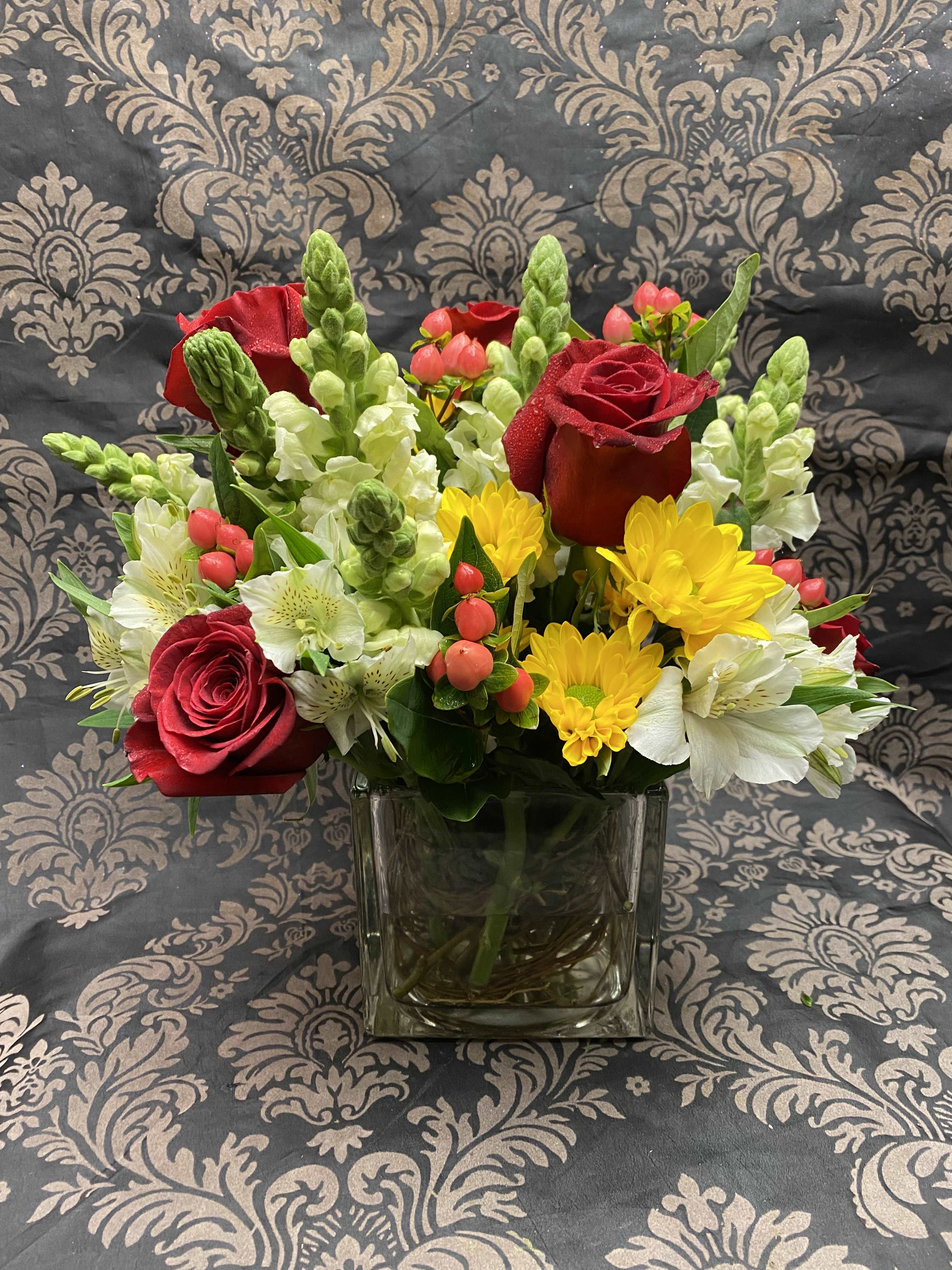 Designer's Choice MD Mix Bouquet.  - Our best seller and customers' favorite. Let our designers design your Mother’s Day custom flowers bouquet with variety of focal blooms from our on-hand and in season inventory in a mix of colors and flowers selections. Bright, Happy, Colorful, Joyous and Fragrance are words often used to describe this collection by our customers. Most often, when given the freedom to create, the arrangement often turns out much better than we promised as it allows our creativity to shine.   Compose in a 5"x5" round clear lined glass vase on Standard. Deluxe and Premium uniquely arranged in a cedar wooden box.