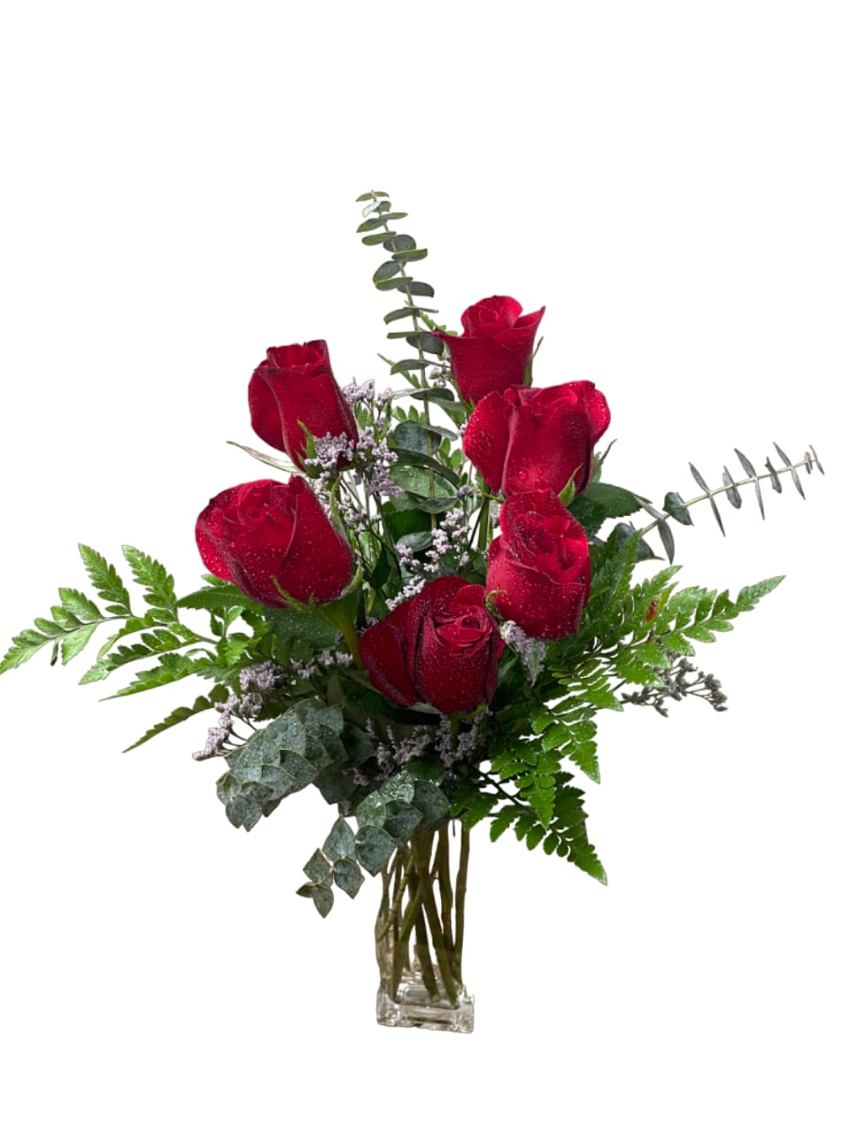 Bouquet of red roses in a clear glass vase