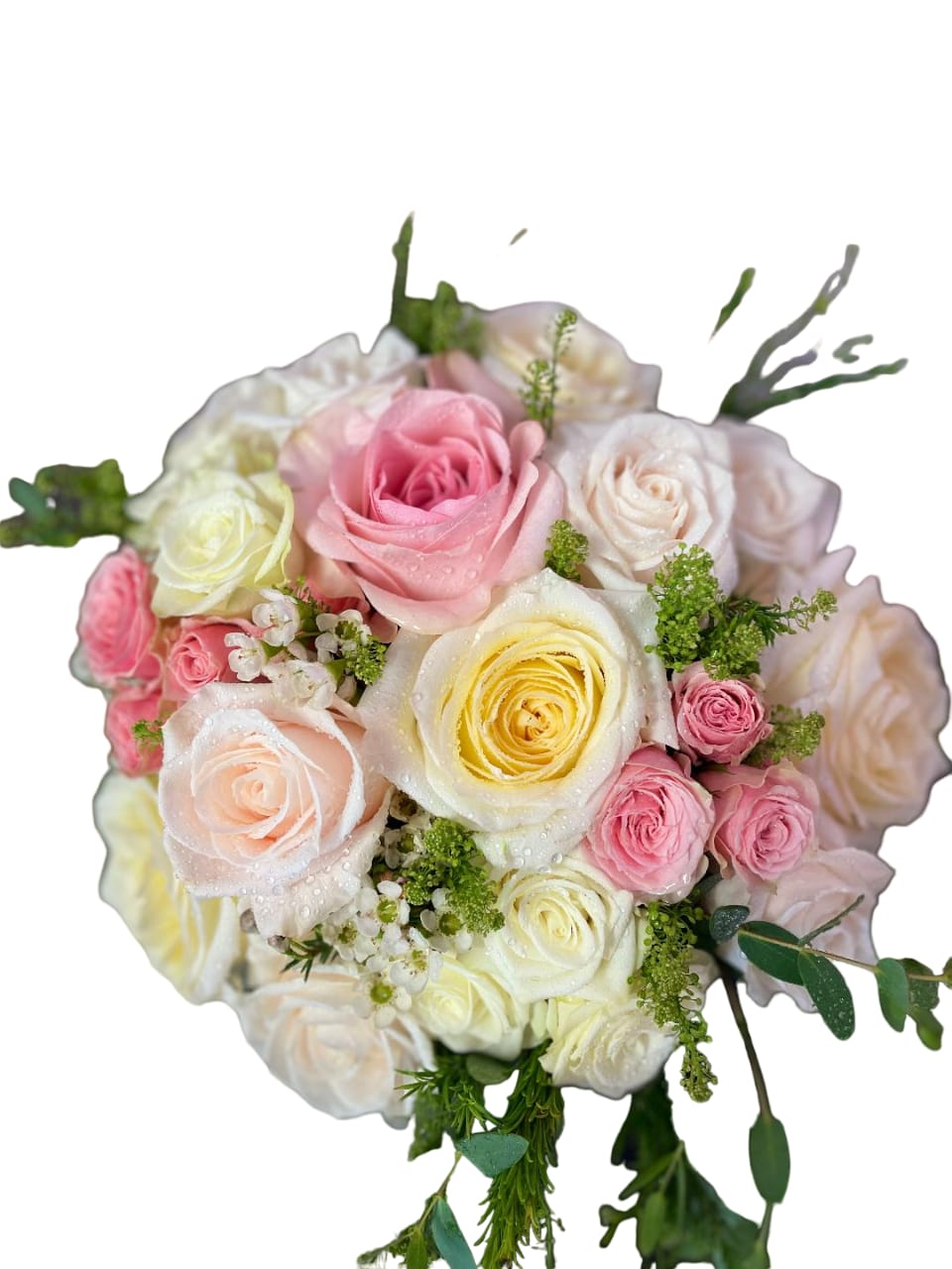 Bouquet of pink, cream, and yellow roses with greenery