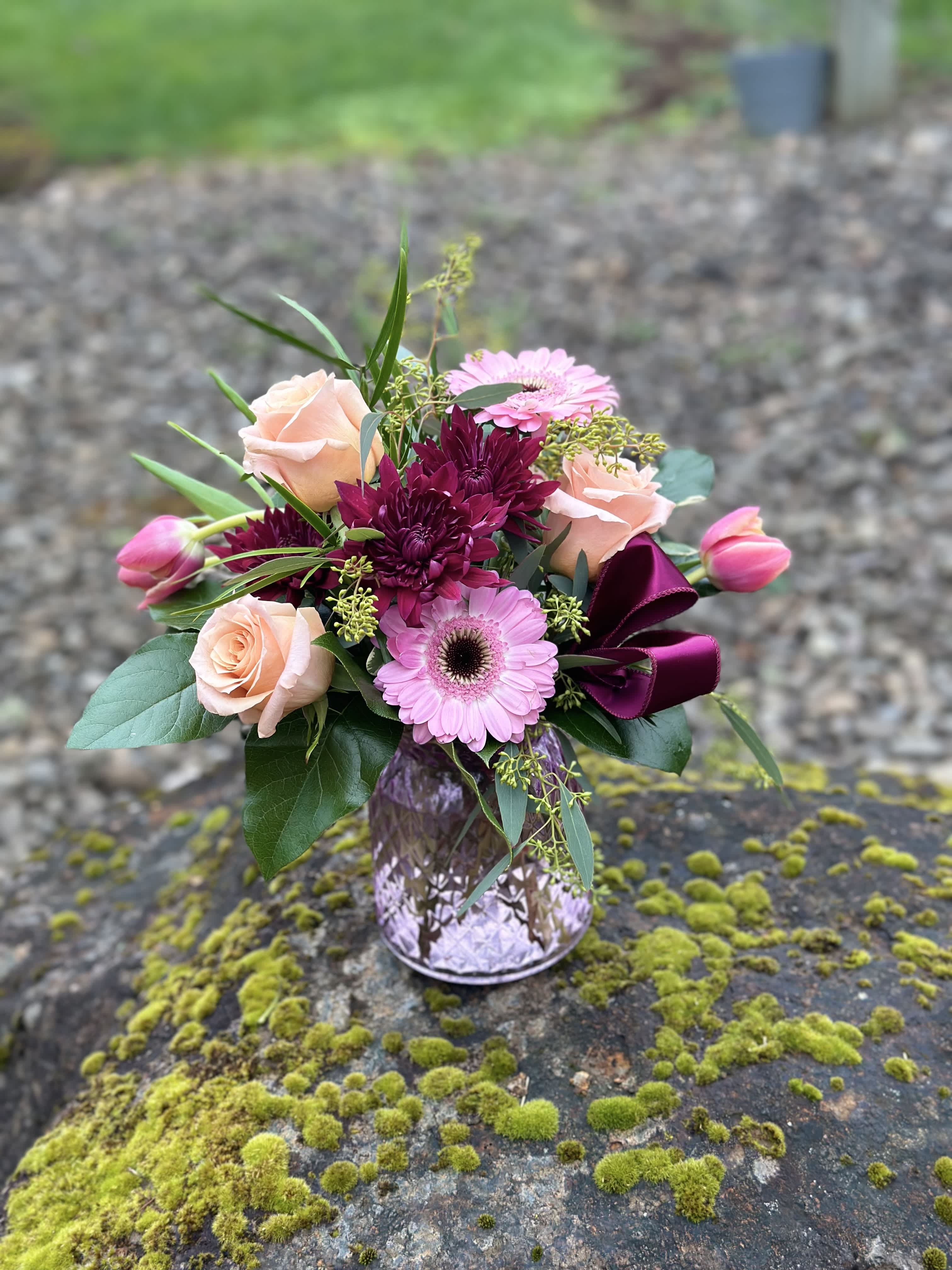 Spring flings - Tulips, roses, gerber daises and mums in a lavender vase 