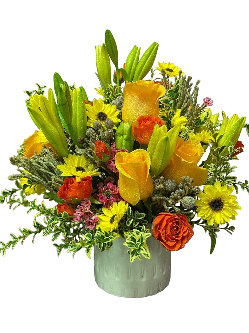 Yellow and orange bouquet with lilies and roses in a ceramic vase