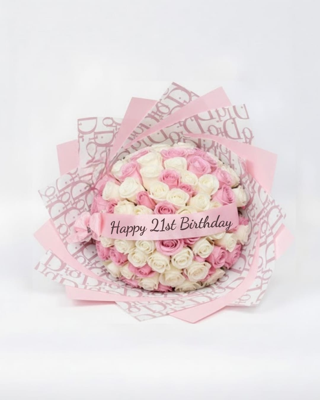 Pink and white rose bouquet with a birthday ribbon