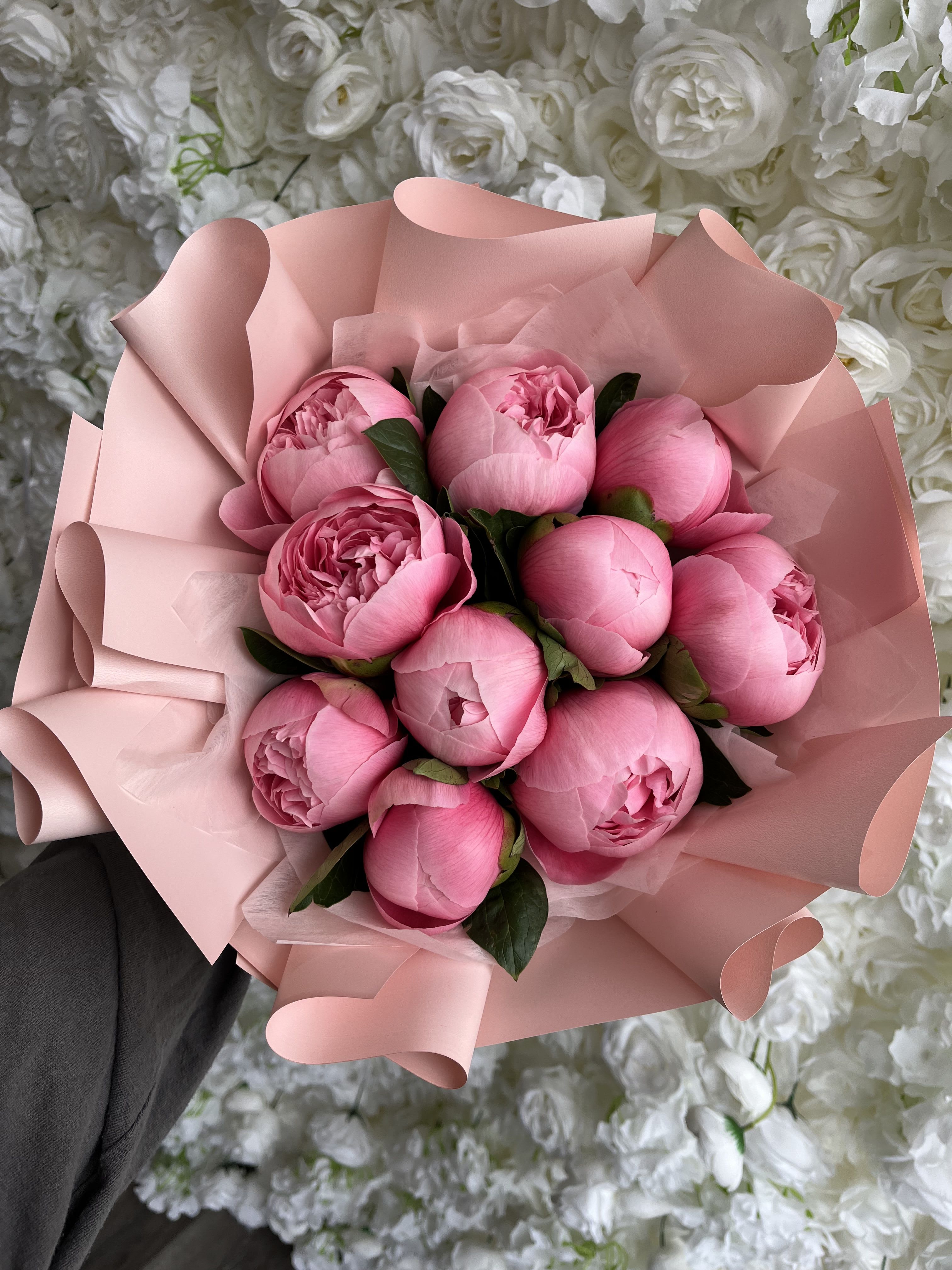 Etched Salmon Peonies - Pink peonies with white accents and green leaves, wrapped in blush pink paper - a romantic, elegant bouquet perfect for anniversaries, Mother's Day, or weddings.