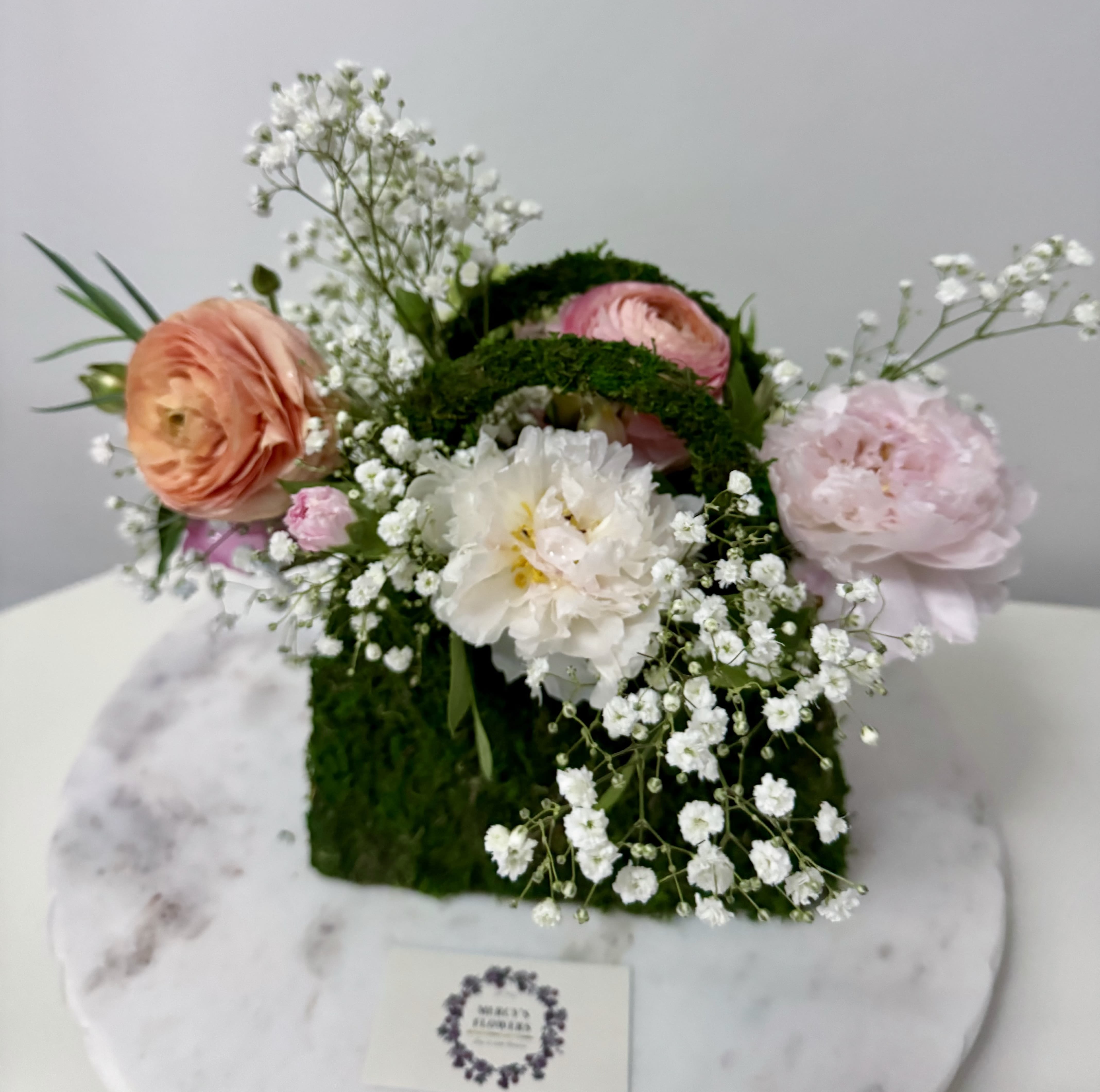 Fabulous Mothers purse with her favorite flower  - A fabulous flower arrangement to celebrate a mother's love, beauty and strength.