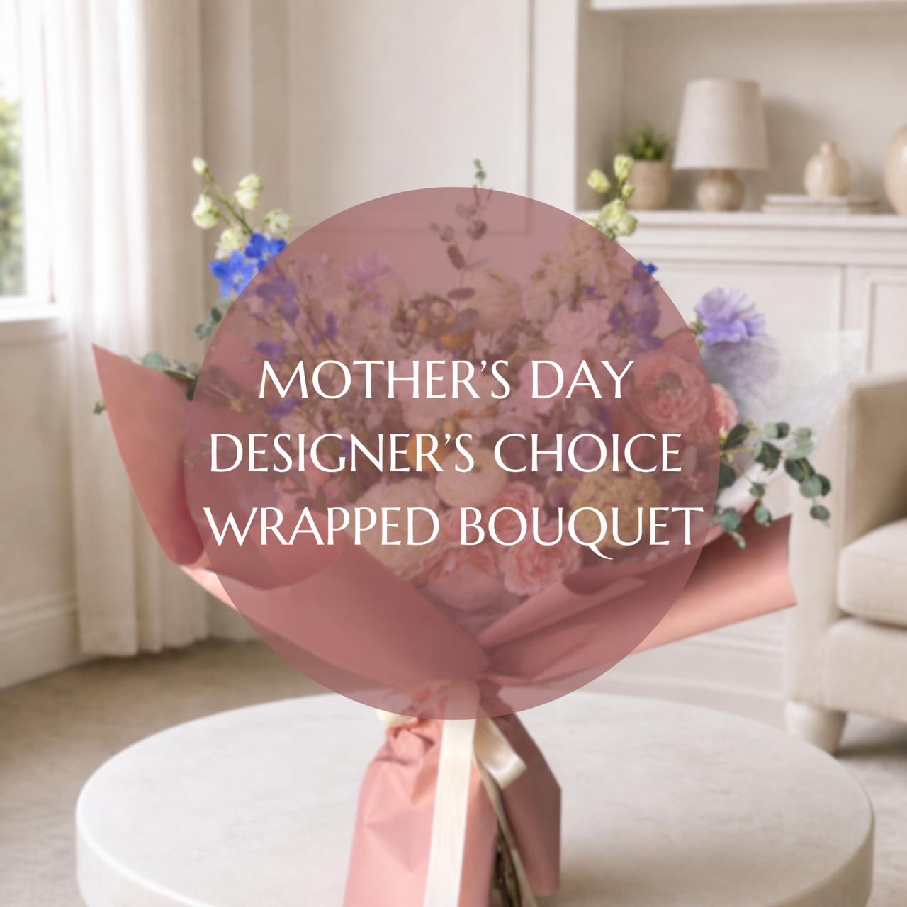 Mother's Day Designer's Choice Wrapped Bouquet - Mother’s Day Designer’s Choice Wrapped Bouquet  Celebrate her with a beautifully curated bouquet designed using the freshest seasonal blooms available in our studio. Each arrangement is one-of-a-kind, thoughtfully composed with a refined balance of color, texture, and movement for an effortlessly elevated look.  Wrapped in our signature premium paper and finished with a soft satin ribbon, it’s a modern, elegant gift made to feel truly special.  Please note: Does not include vase.