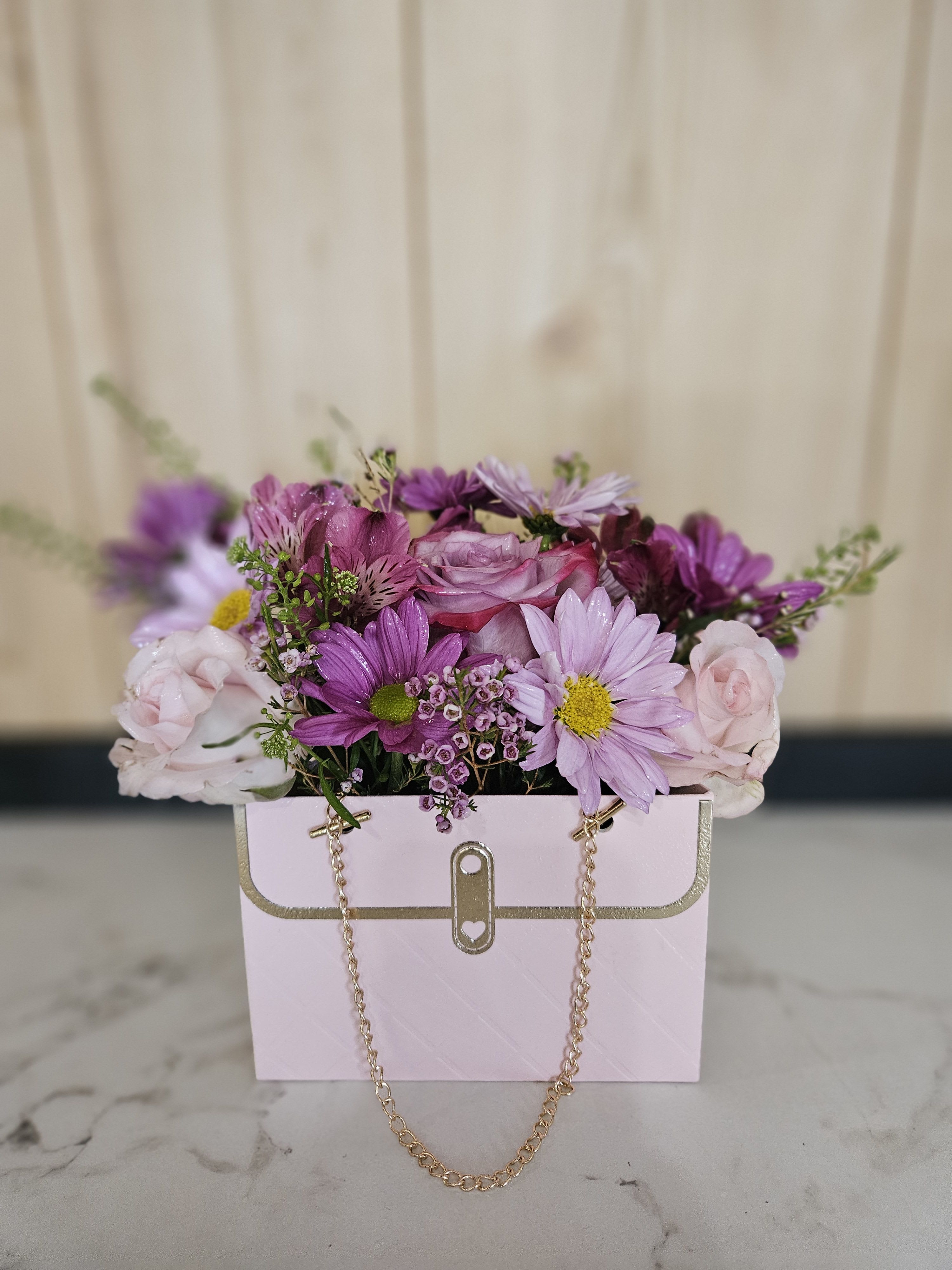 Mini Birkin  - Soft, delicate, and effortlessly charming.  Arranged in a mini floral hand bag ,it’s the perfect gift for celebrating love, friendship, and beautiful moments.