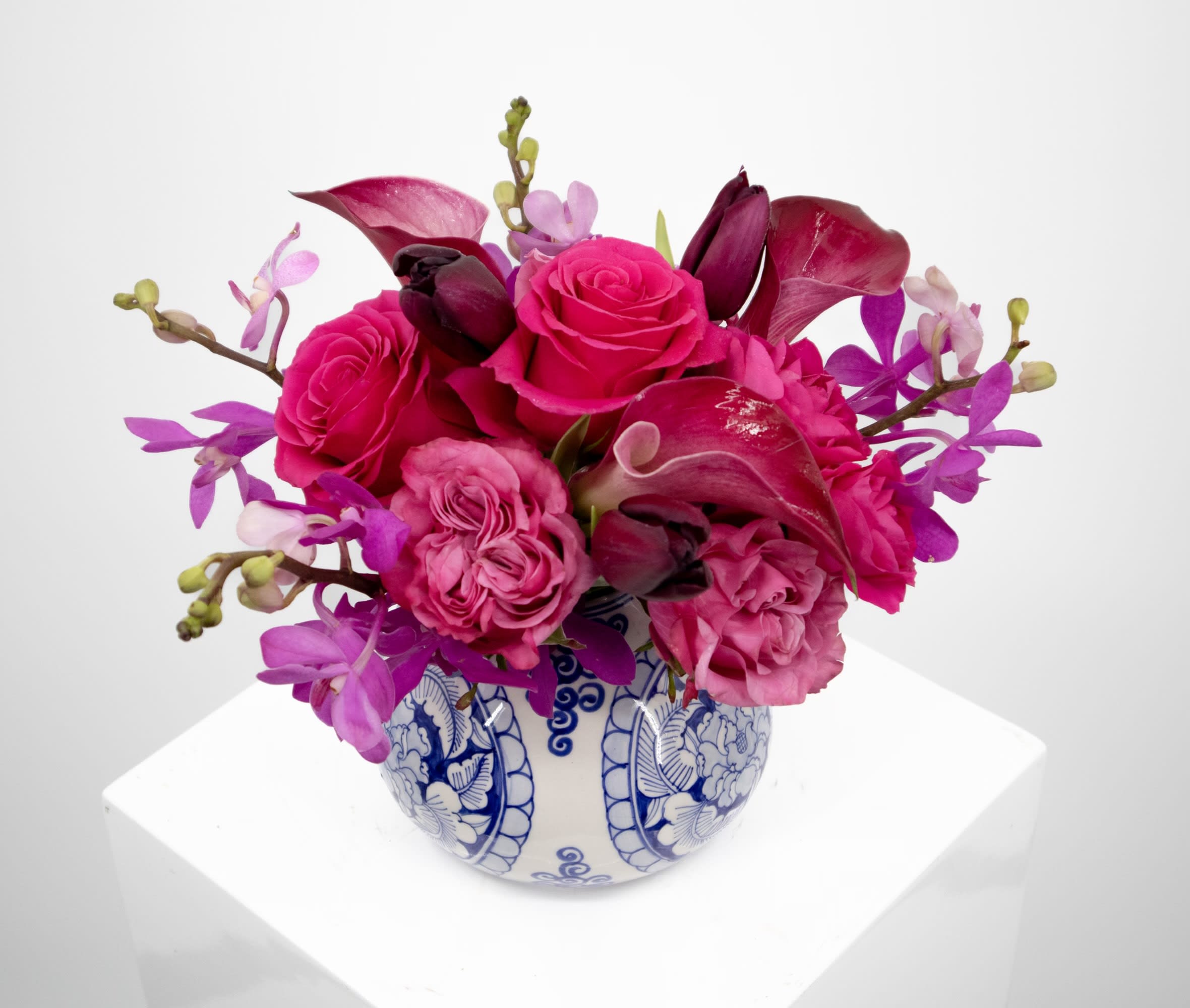Eric - Bright and festive flowers in a beautiful chinoiserie vase. 