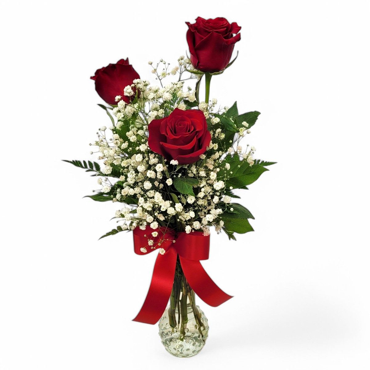 Simply Roses - Love can be complicated, but not with this arrangement. Simply Roses, three beautiful RED roses artfully displayed to convey your feelings of love. Simply roses, simply, "I Love You" Easy, right?