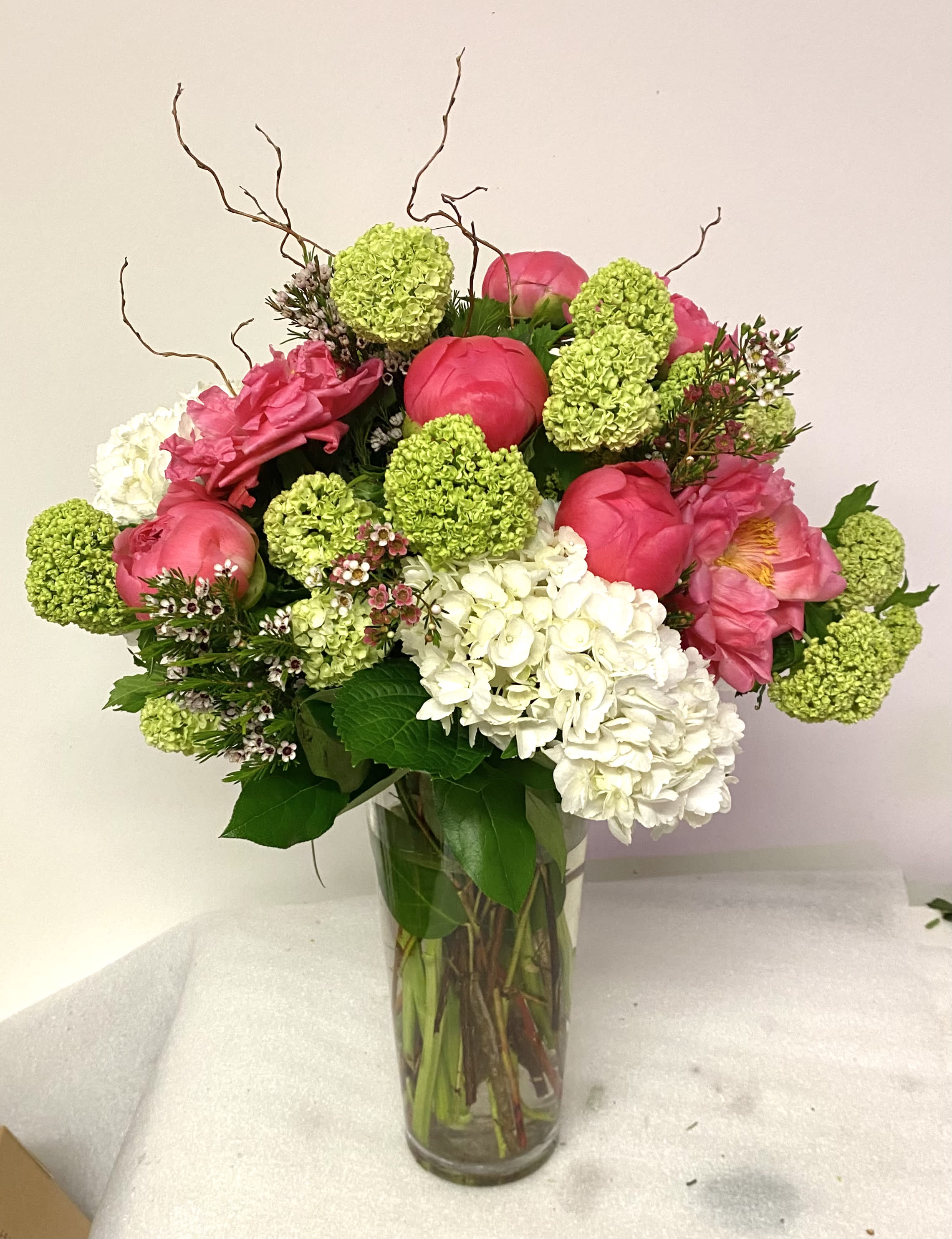 Large vase with Coral Peonies -  impressive peace filled with hydrangeas, coral peonies and viburnum 