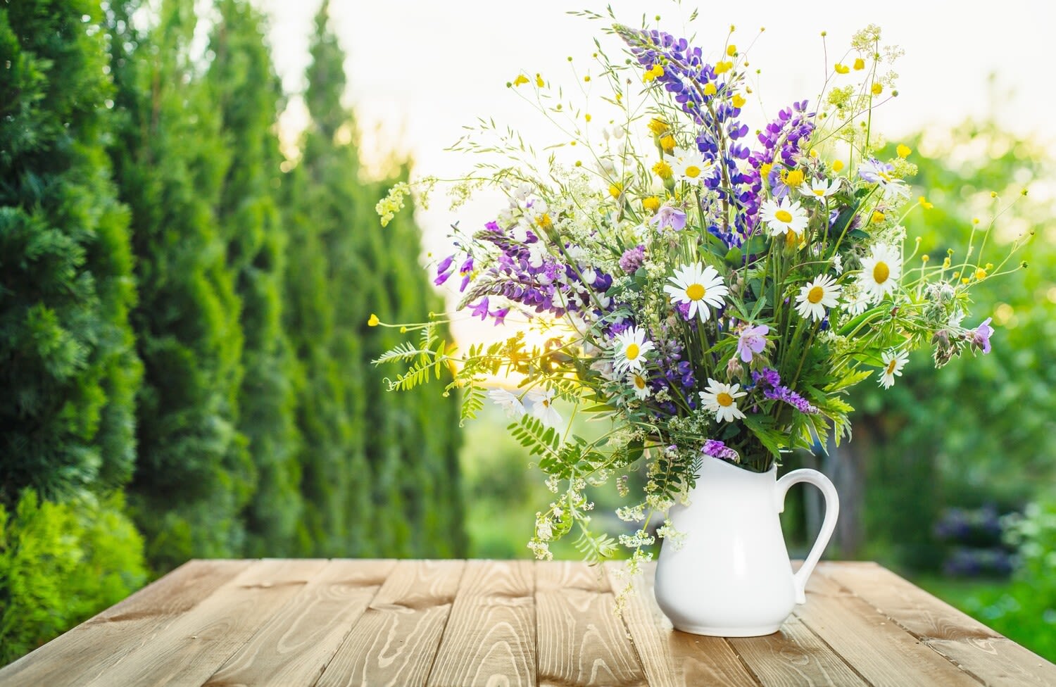 MOM'S VINTAGE GARDEN  - I START WITH A VINTAGE PITCHER, THESE ARE SORCED FROM ANTIQUE STORES, ESTATE SALES, GARAGE SALES, THRIFT STORES, ETC. I LOOK FOR INTRESTING PITCHERS, SOME OLD, SOME NOT SO OLD, THE IMPORTANT THING IS THAT WHAT ARE WELL SUITED FOR THIS LARGE ARRANGEMENT. THEN I FILL THE PITCHER WITH LOOSE, FREE FLOWING FLOWERS IN ALL AVAILBLE COLORS IN MY INVERNTORY, CREATING A WILD LOOK, LIKE I JUST WALKED THOUGH THE GARDEN IN THE MIDDLE OF SUMMER AND PICKED A WILD BOUQUET! PITCHER COLOR WILL VARY. SUPPLIES ARE LIMITED 