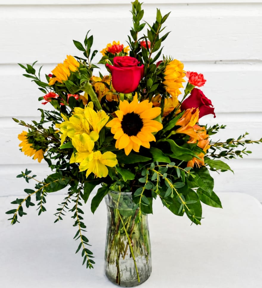 Sunshine And Roses - This design captures the perfect balance of bold color and natural elegance—making it an ideal gift for birthdays, celebrations, thank-you moments, or simply to brighten someone’s day. Handcrafted with care at Quinlan Florist and Gifts, each bouquet is arranged fresh to order for a full, long-lasting presentation.