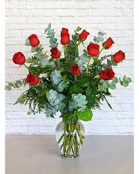 Dozen Roses - You pick the color! - For the perfect, traditional Valentine’s Day bouquet – or for a birthday, anniversary or other special day – this bouquet of a dozen red roses adorned with a classic mix of white baby’s breath and ferns is a classic gift of love. Send it today, and she’ll love you forever. Available in many colors.