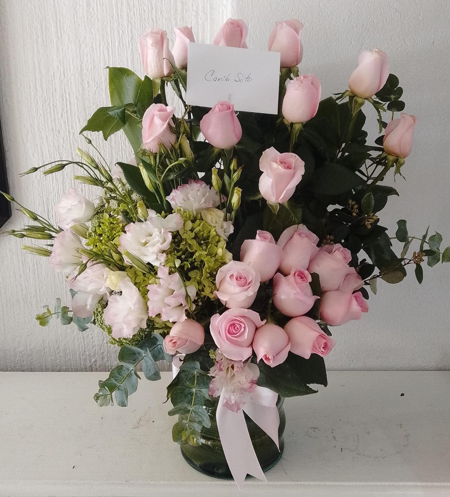 Blush Pink Garden Arrangement - A charming pink flower arrangement in San Antonio featuring fresh pink roses, lavender chrysanthemums, mini carnations, hypericum berries, and seasonal greenery beautifully designed in a modern glass vase. Handcrafted by Snyder Flowers San Antonio, this elegant floral arrangement brings a soft romantic touch perfect for birthdays, anniversaries, Mother’s Day, get well wishes, or thoughtful gifts.   We proudly offer same-day flower delivery in San Antonio with fresh premium flowers and exceptional customer service.  Elegant floral designs created with high-quality blooms, modern garden style, and affordable prices.  Serving Stone Oak, Medical Center, Alamo Heights, Cibolo, Universal City, Live Oak, Helotes, Castle Hills, Shavano Park, and Downtown San Antonio.  Looking for a trusted florist in San Antonio, same day flower delivery, or pink rose arrangements near you? Snyder Flowers creates fresh luxury flower arrangements designed to impress for every special occasion.