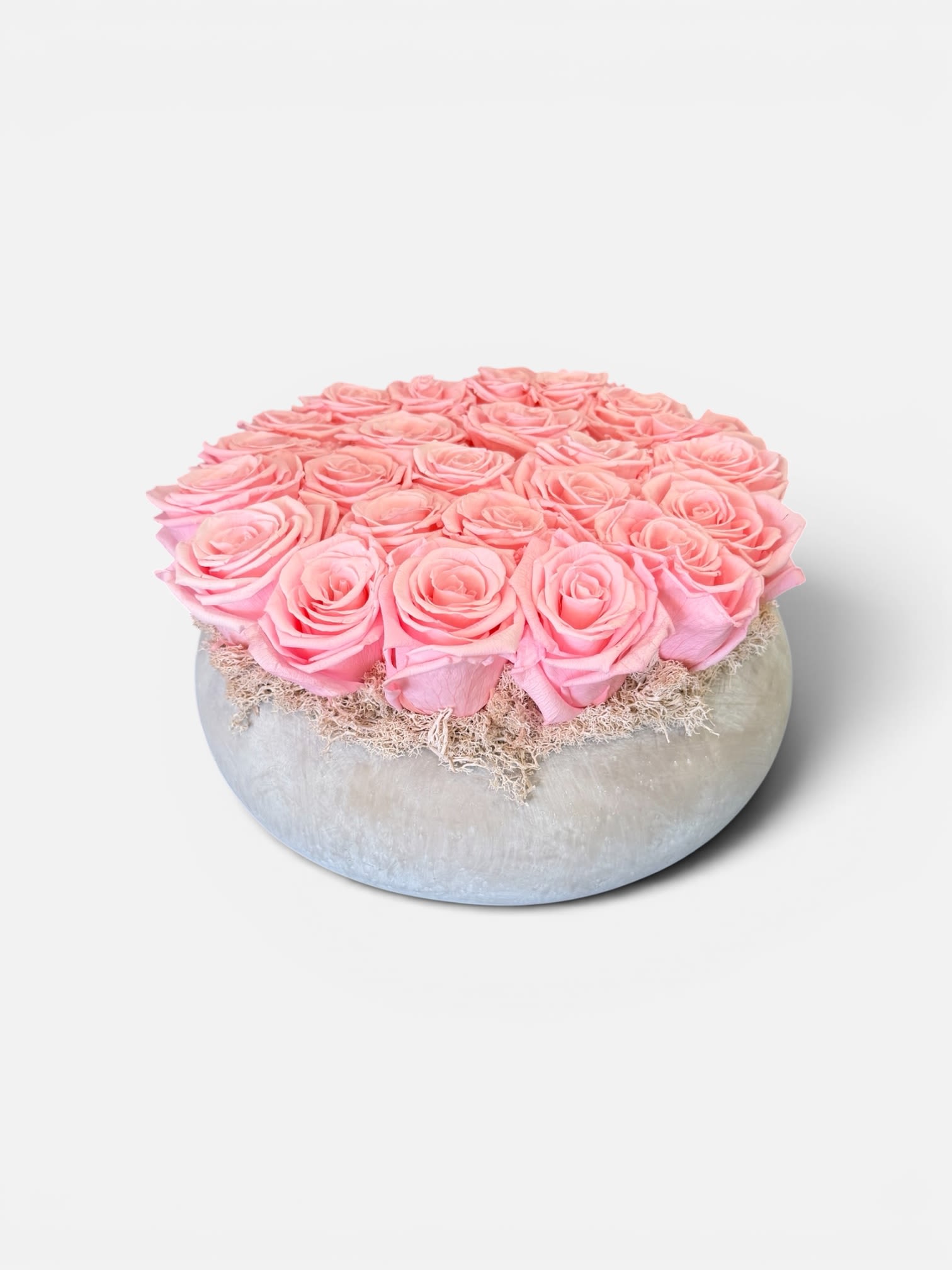Eternal Blush Garden - A delicate arrangement of premium preserved blush, pink roses, thoughtfully, arranged in a modern ceramic vessel, and designed to last up to three years. Soft, elegant, and timeless, this piece brings a romantic touch of lasting beauty to any space. -no maintenance required 