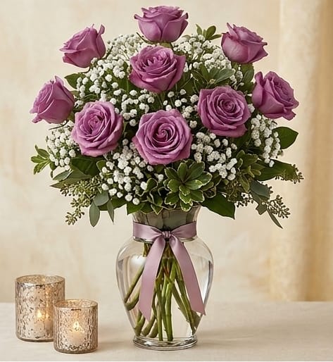 PURPLE ROSES - PURPLE/LAVENDER ROSES ARRANGED IN A VASE, WITH GREENS AND FILLERS, IF YOU KNOW A PURPLE LOVER, THIS IS YOUR ROSE! NOT ALWAYS, BUT NORMALLY, THESE LAVENDER ROSES ARE FRAGRANT, WIN, WIN! 