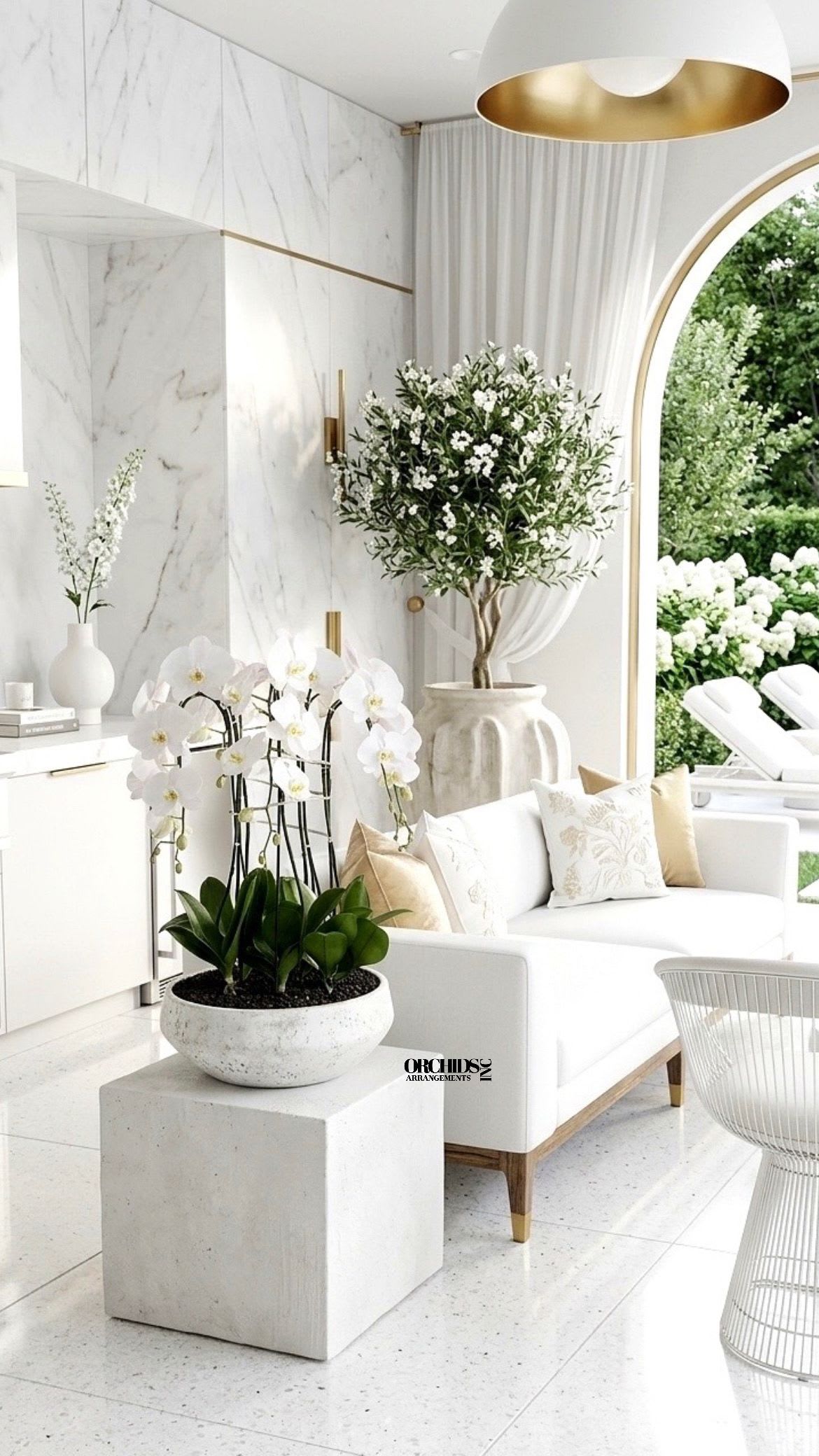 Expressive Orchid Miami - This elegant Seven White Phalaenopsis Cascade orchid arrangement creates a striking vertical presence, making it ideal for grand interiors and modern living spaces with a vase 16.5" D X 6" T.