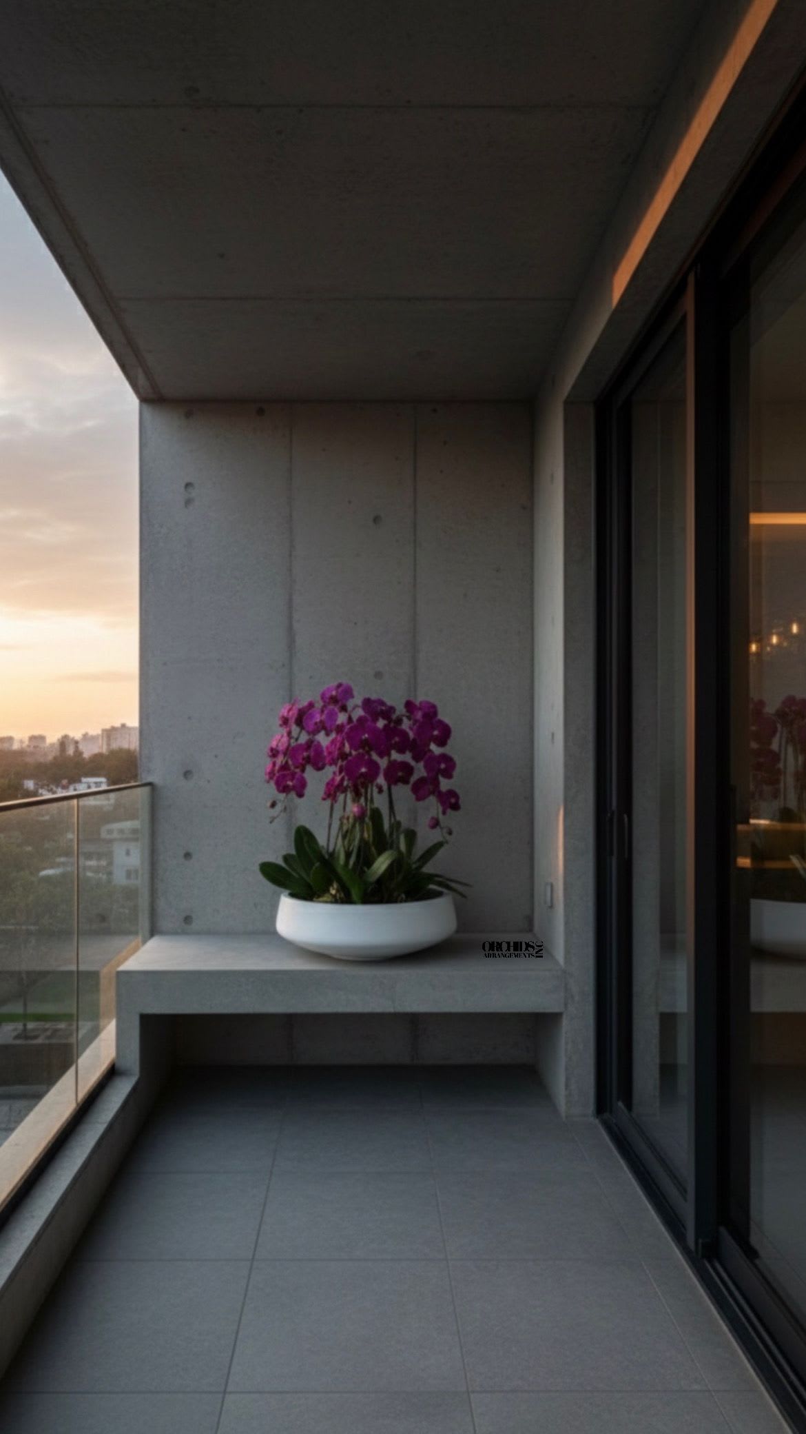 Potted purple orchids in a white bowl planter on a balcony