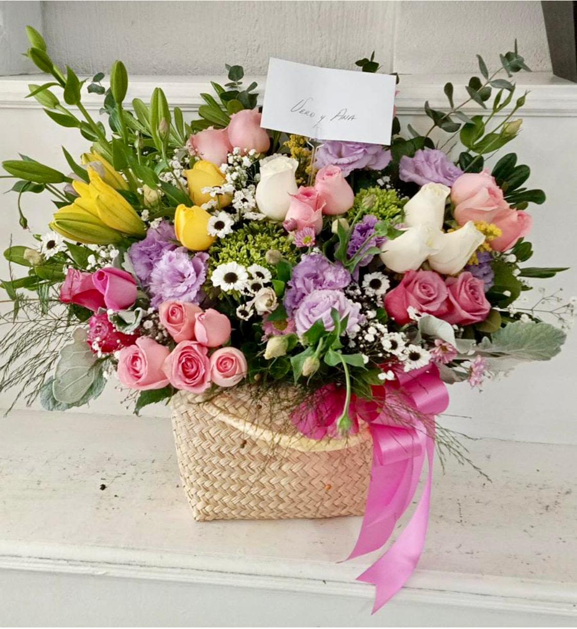 Garden Basket Luxury Arrangement - A beautiful flower arrangement in San Antonio featuring fresh pink roses, white and yellow roses, lilies, lisianthus, daisies, baby’s breath, and premium seasonal greenery designed in an elegant woven basket with a decorative ribbon. Handcrafted by Snyder Flowers San Antonio, this garden-style floral arrangement offers a soft, romantic, and natural look perfect for birthdays, Mother’s Day, anniversaries, get well wishes, or thoughtful gifts.   We proudly offer same-day flower delivery in San Antonio with fresh premium flowers and exceptional customer service.  Luxury floral designs created with high-quality blooms, garden-style elegance, and beautiful presentation.  Serving Stone Oak, Medical Center, Alamo Heights, Cibolo, Universal City, Live Oak, Helotes, Castle Hills, Shavano Park, and Downtown San Antonio.  Looking for a trusted florist in San Antonio, same day flower delivery, or garden style flower arrangements near you? Snyder Flowers creates handcrafted floral designs with fresh roses, lilies, and premium flowers delivered beautifully for every special occasion.