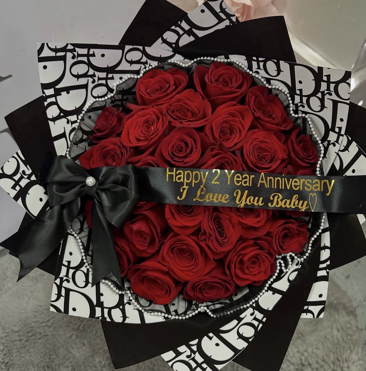 Luxury Dior (25 Roses ) - 25 Red Roses wrapped in Dior elegance ️ Because love deserves luxury. We can change the ribbon message to happy birthday , happy anniversary , happy Mother’s Day or I love you , let me know In the instructions before check out .   Perfect for anniversaries, birthdays, or just because  Order yours today.   7414 S Central Ave Los Angeles, CA 90001  323-420-9151  www.brendasbeautyflowers.com  #RedRoses #LuxuryFlowers #DiorStyle #ramobuchón #RosesBouquet #LoveInBloom FlowersOfInstagram #LAFlorist RomanticGift #25Roses