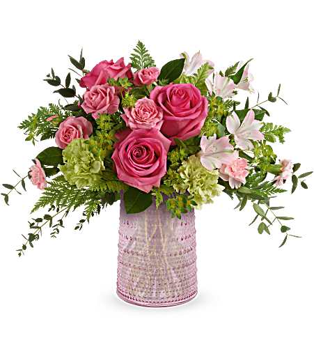 Pink roses and white lilies in a pink textured vase
